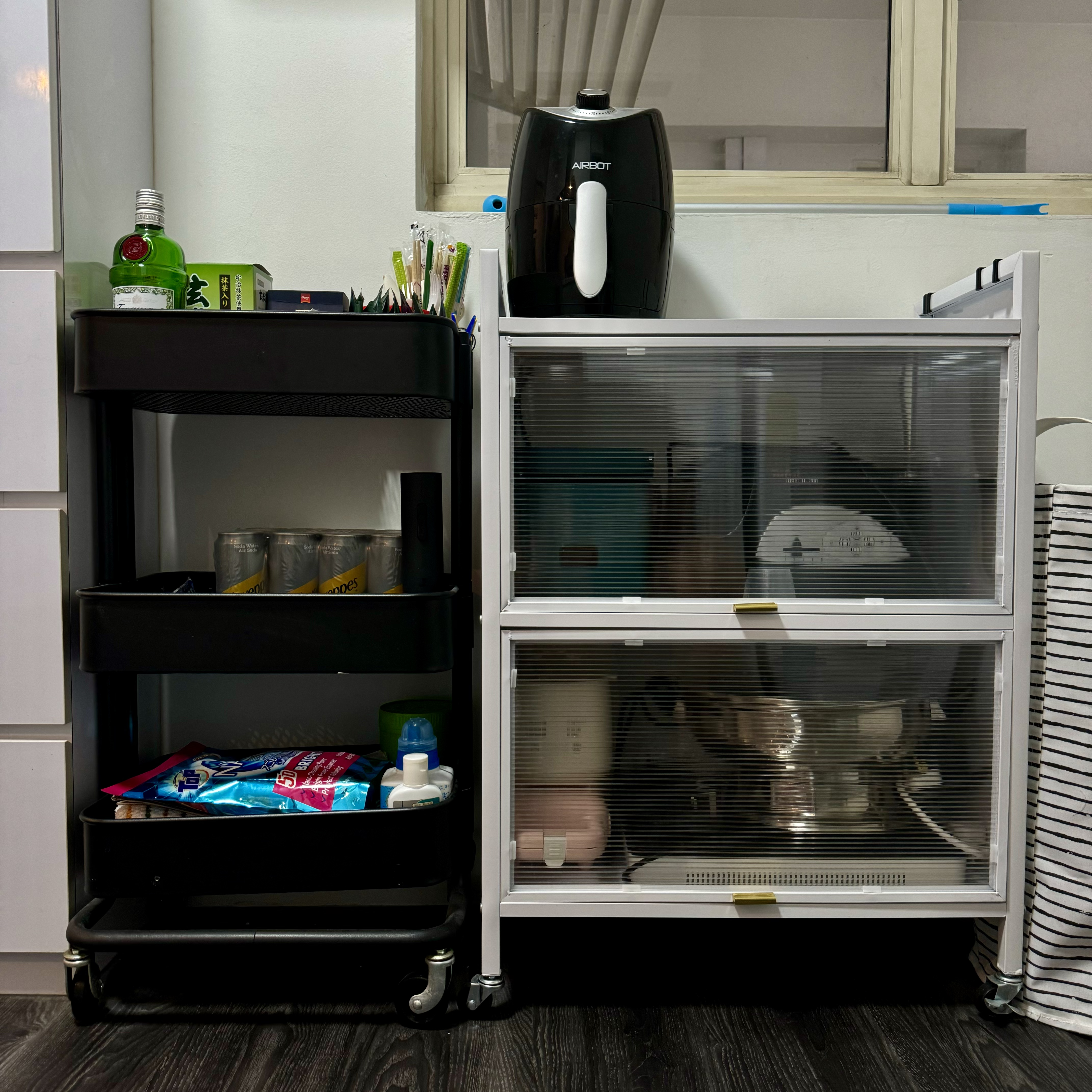 Simplicity in Style: A Tour of Our Minimalist Kitchen with A Twist - glass cabinet, kitchen shelves, cleaning supplies, dish