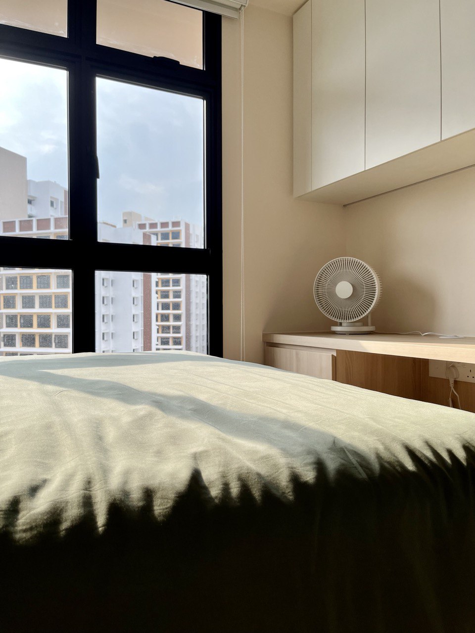 Coziest Corner of The House in This 3-Room BTO: Common Bedroom - Sunlight streaming through large window, beige walls