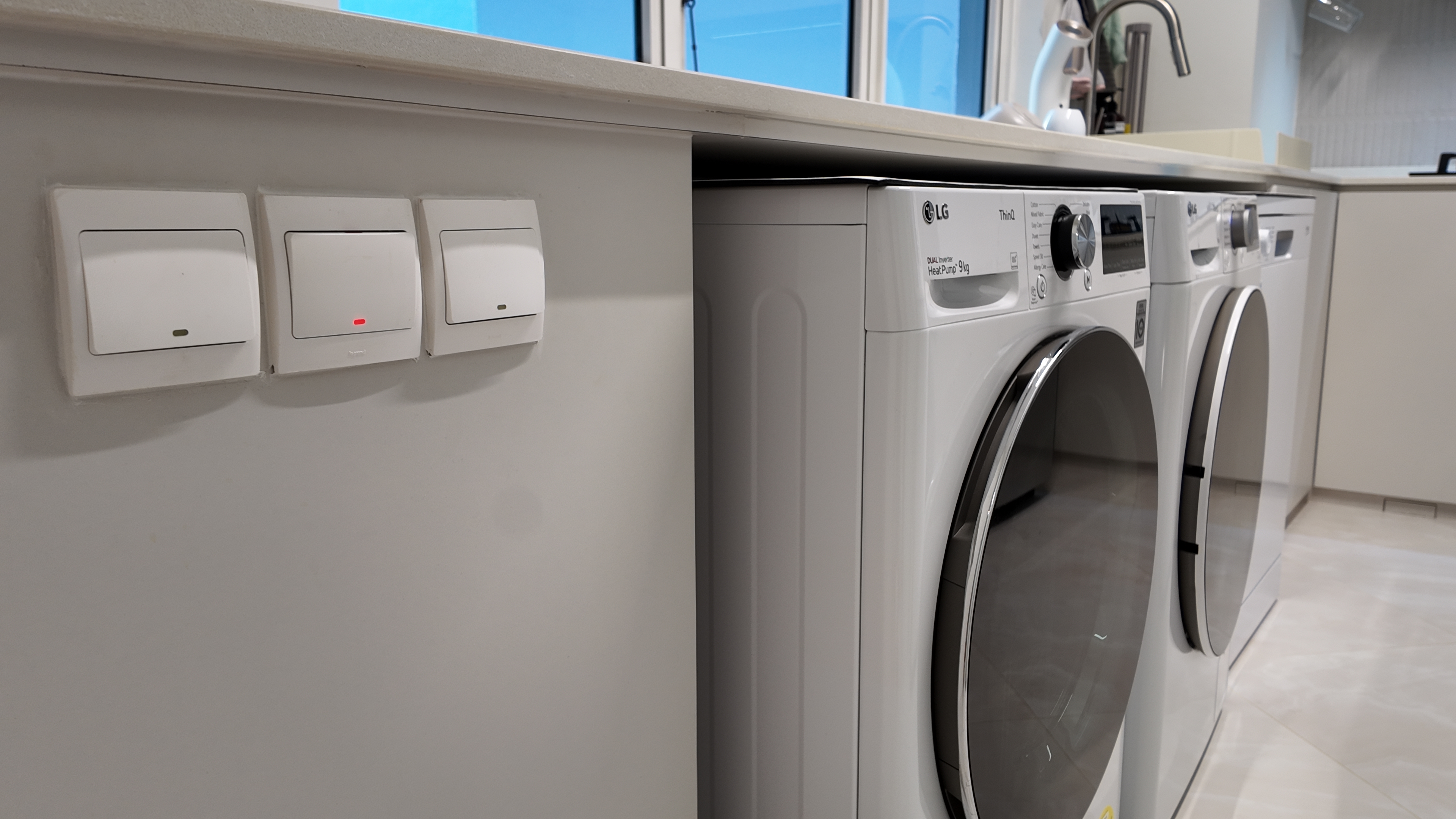 Our Simple U-Shape Kitchen: Maximising Space Without a Service Yard - Wall-mounted control panel, white switches, LG washing