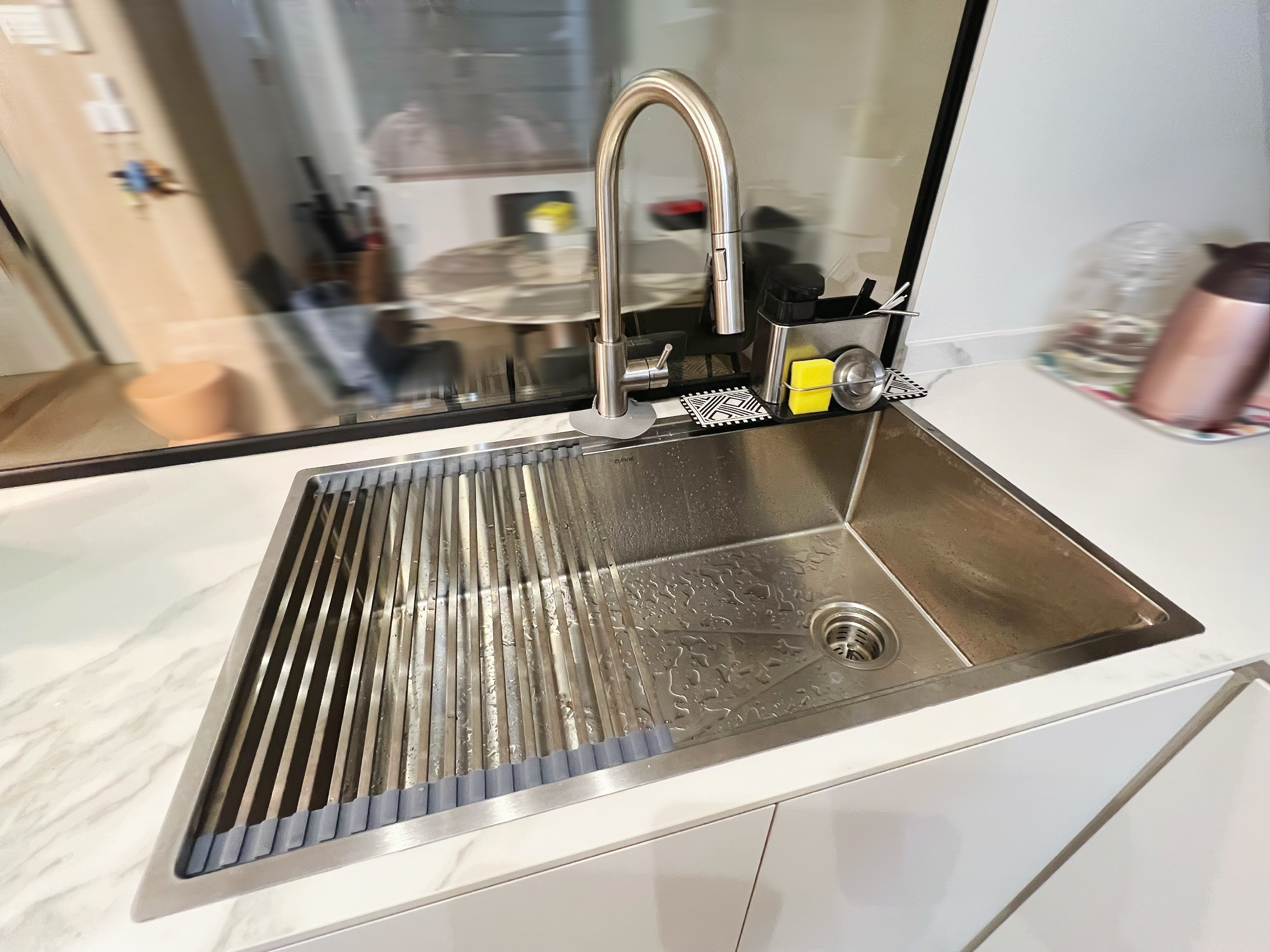 An all white kitchen separated  into wet and dry areas - Modern kitchen sink, stainless steel finish, sleek design