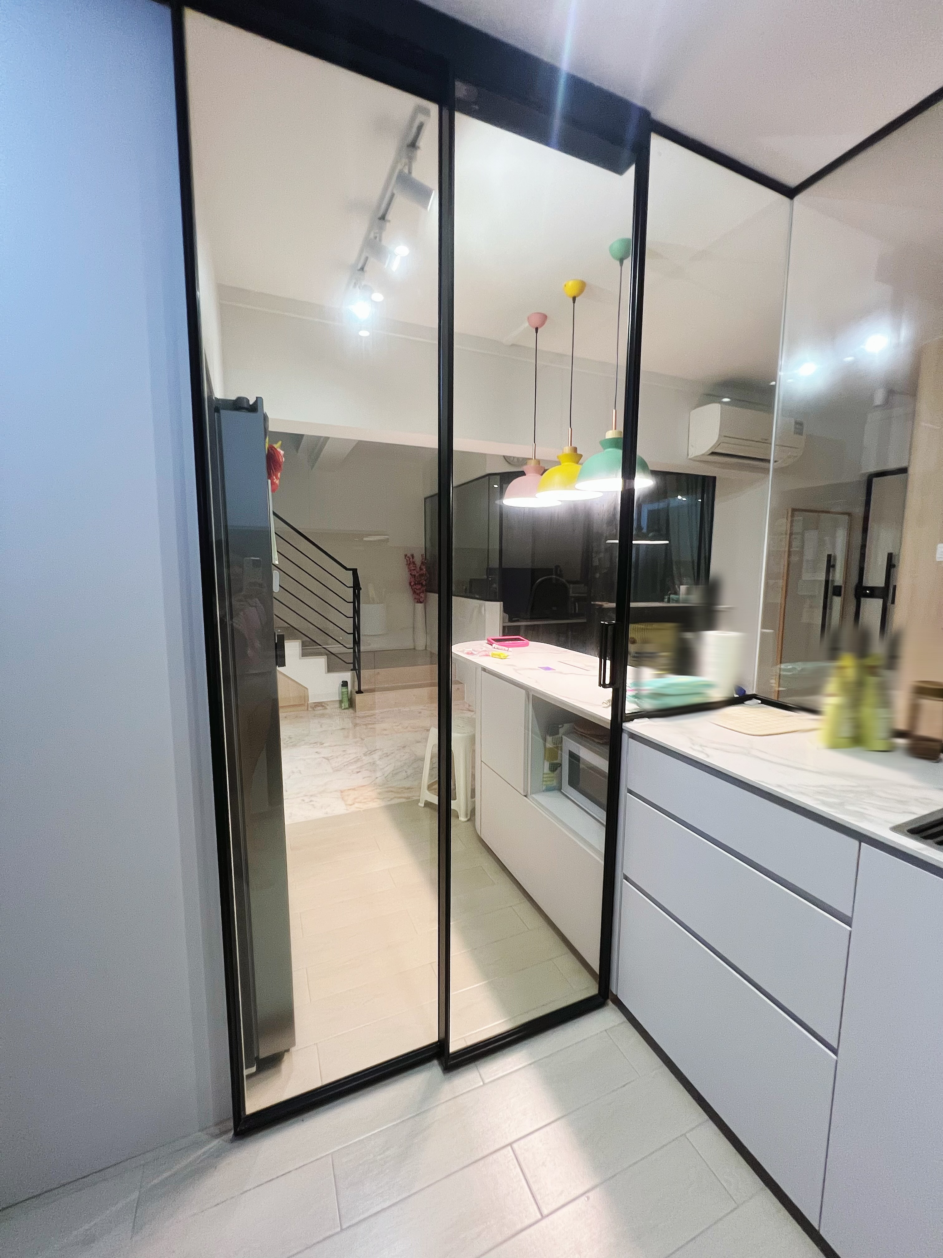 An all white kitchen separated  into wet and dry areas - Glass doors kitchen, modern kitchen design, white cabinets