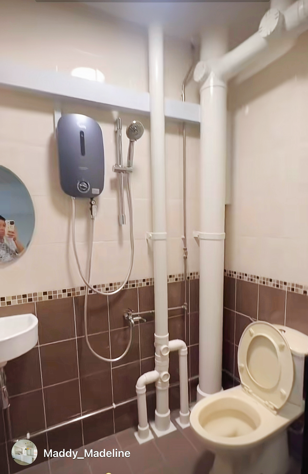 An all white kitchen separated  into wet and dry areas - Bathroom fixtures, toilet, showerhead, bidet, mirror, sink, tiled