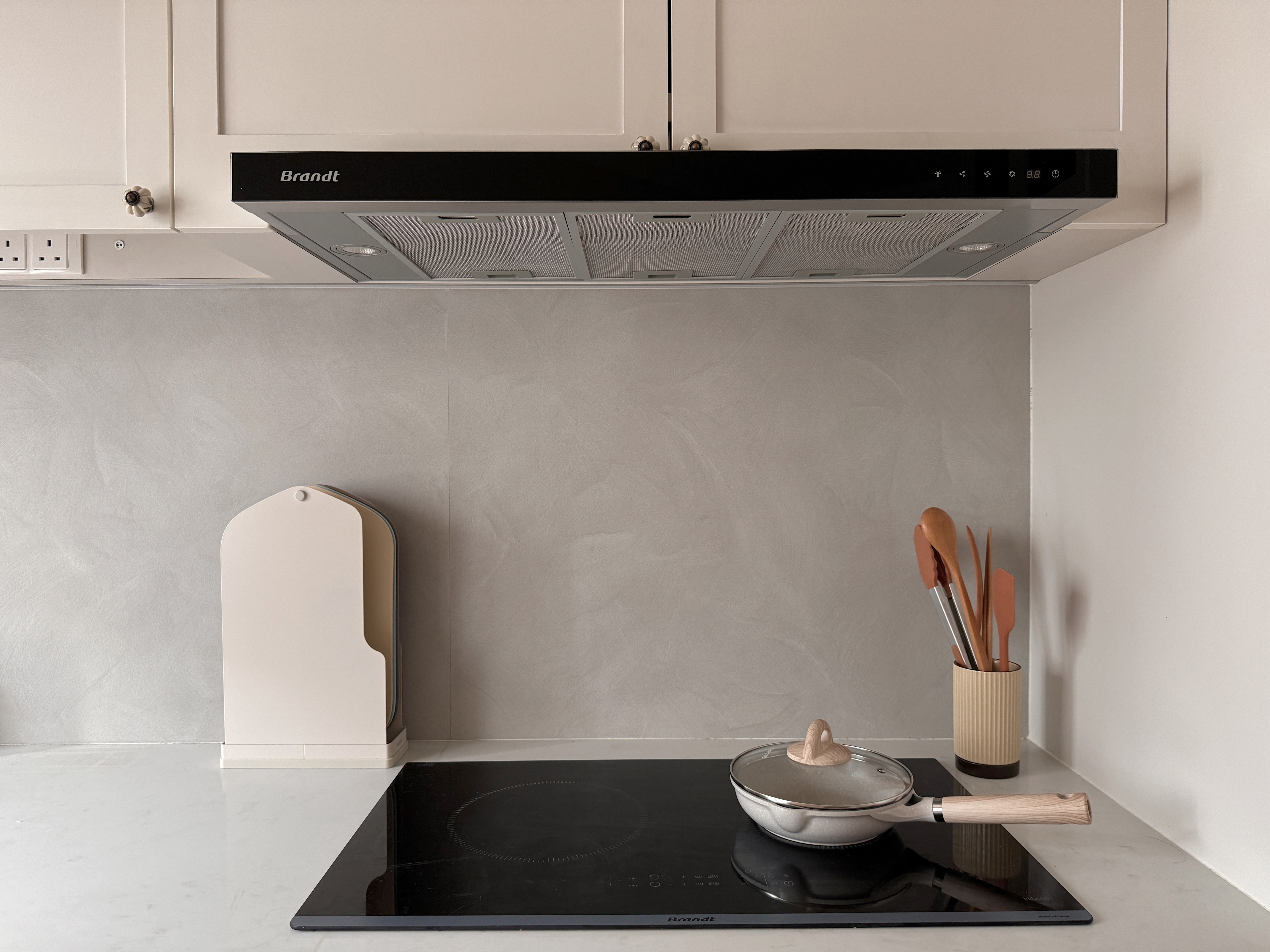 Small Kitchen, Big Ideas: Our Triangle Layout with Laundry Space - modern kitchen, stainless steel range, black induction