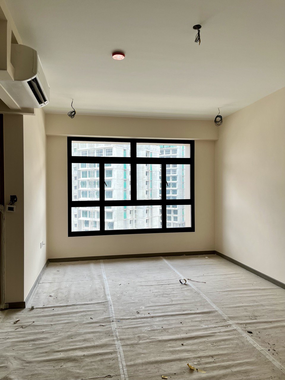 Bare to Cozy: Before & After Renovation of a 3-Room BTO Living Room - Large open floor plan, unfinished walls, beige walls