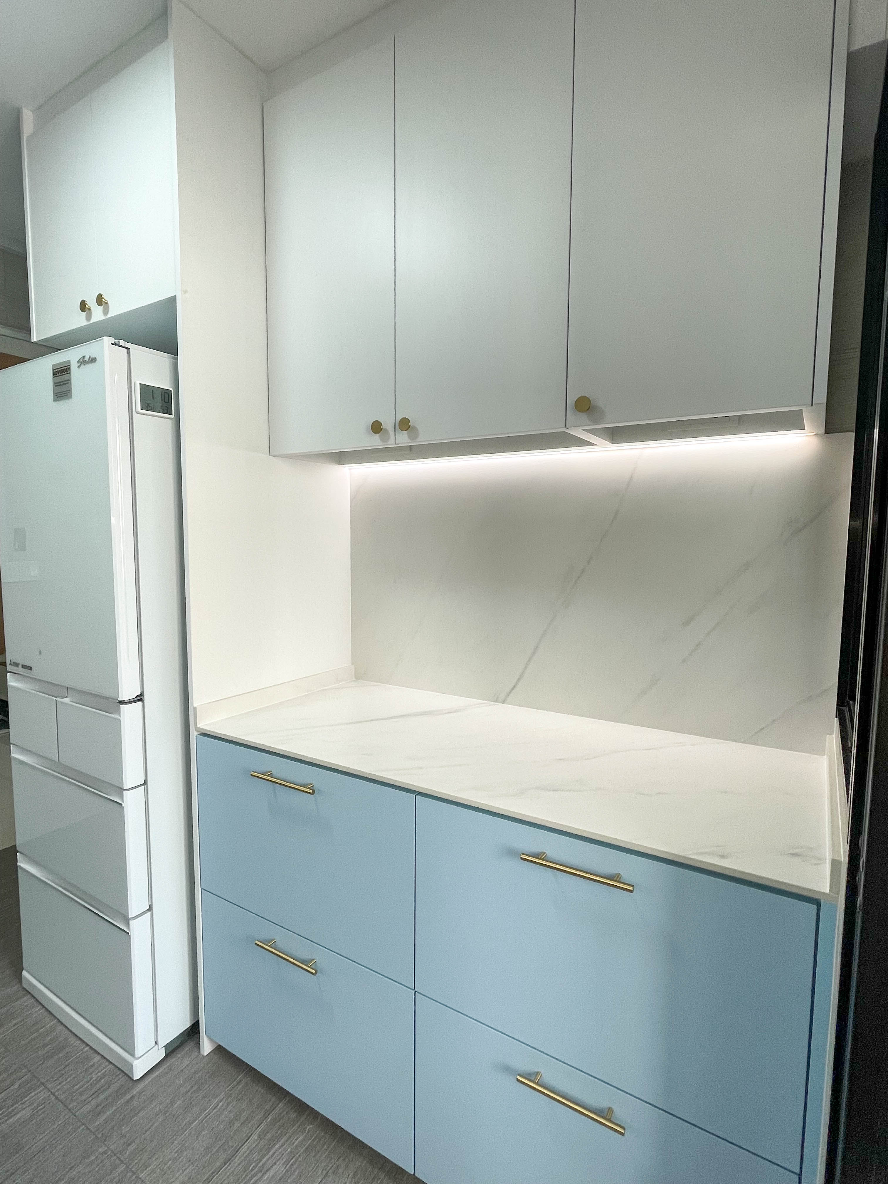 Revamping Our Kitchen: Creating a Clean, Coastal Kitchen - White kitchen cabinets, light blue countertops, modern design