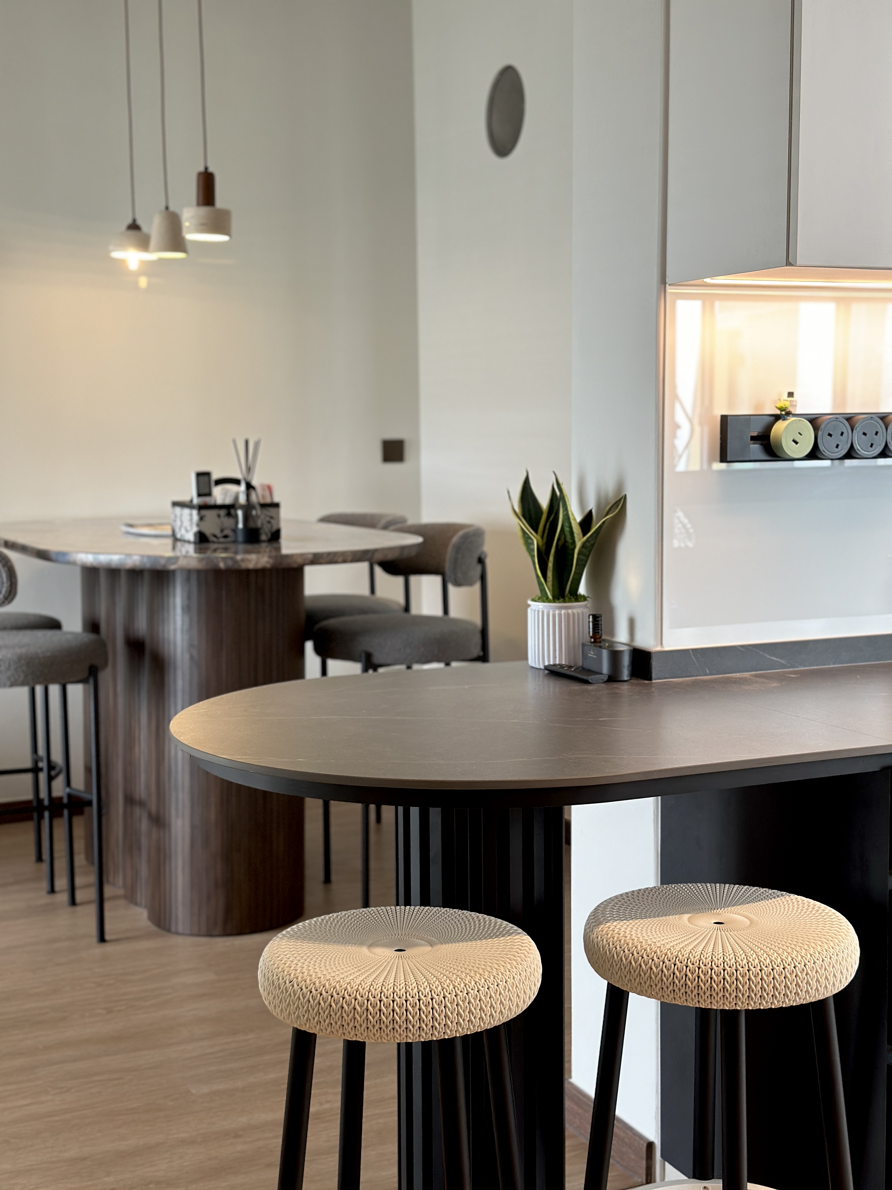 Efficient and Elegant: Our Monochrome Kitchen Design  - modern dining room, minimalist design, sleek furniture, round tables