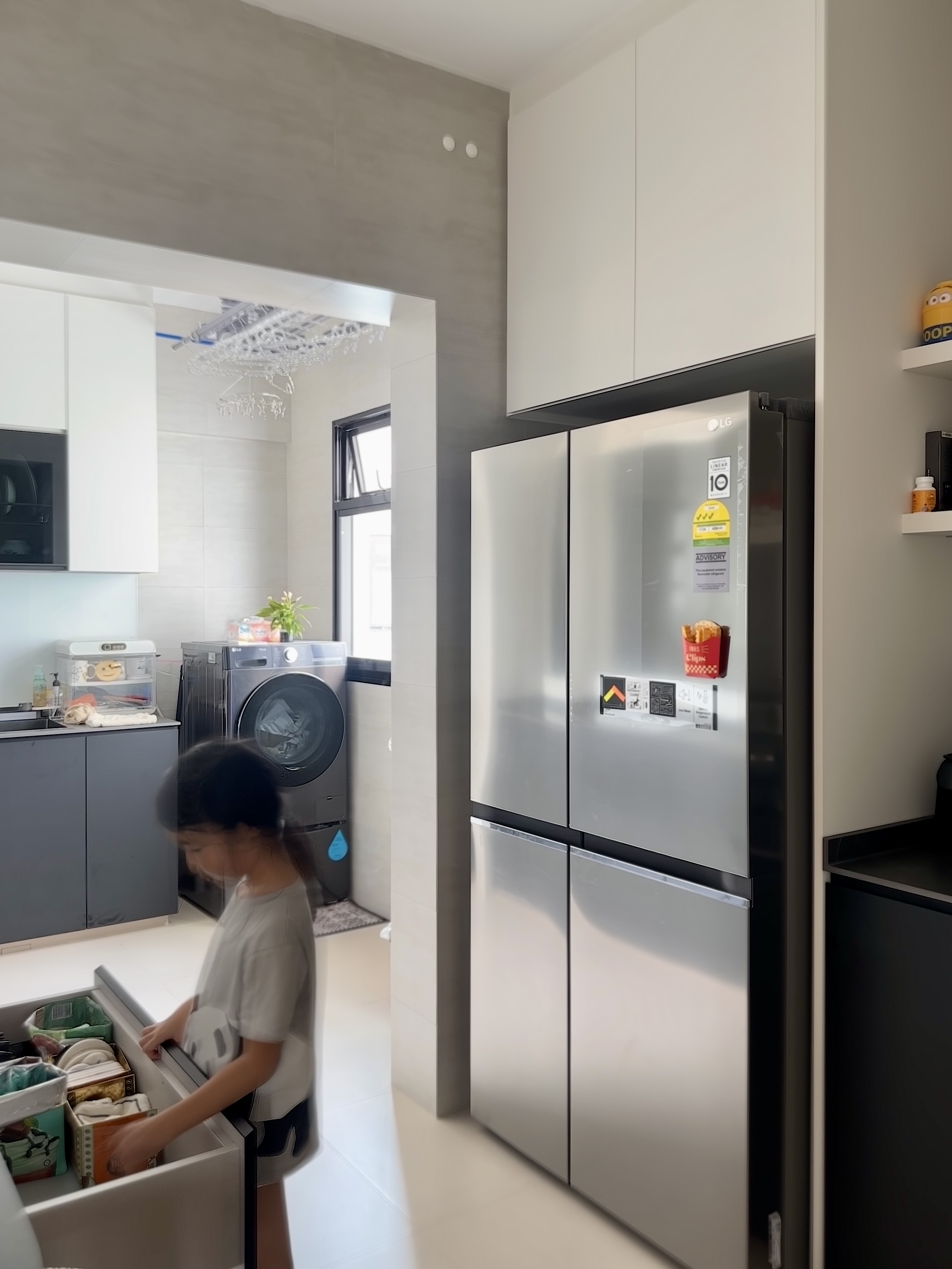 Efficient and Elegant: Our Monochrome Kitchen Design  - Modern kitchen, sleek design, stainless steel refrigerator, open