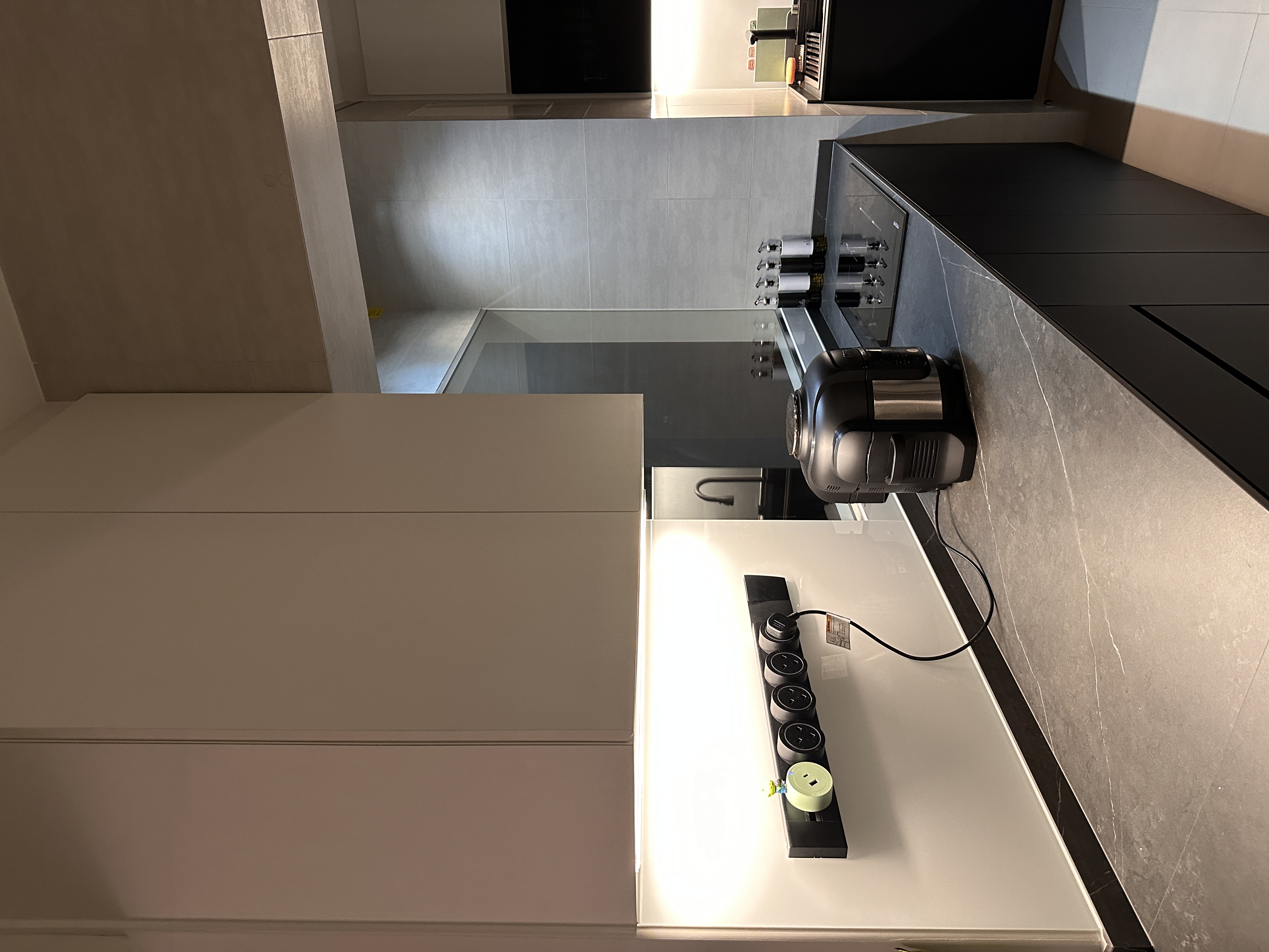 Efficient and Elegant: Our Monochrome Kitchen Design  - Modern kitchen countertop, sleek appliances, minimalist design