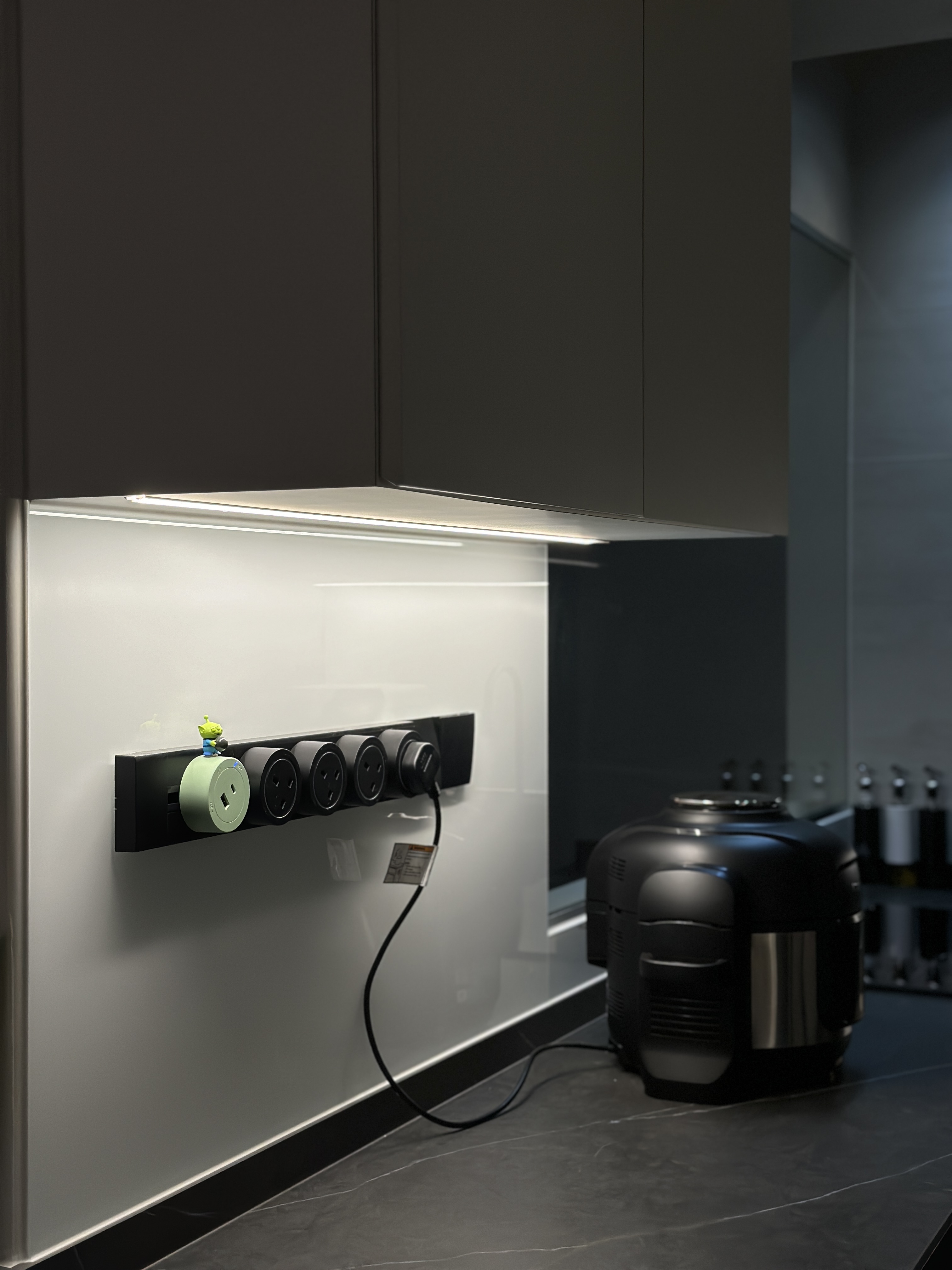 Efficient and Elegant: Our Monochrome Kitchen Design  - Modern kitchen, sleek cabinets, under-cabinet lighting, charging