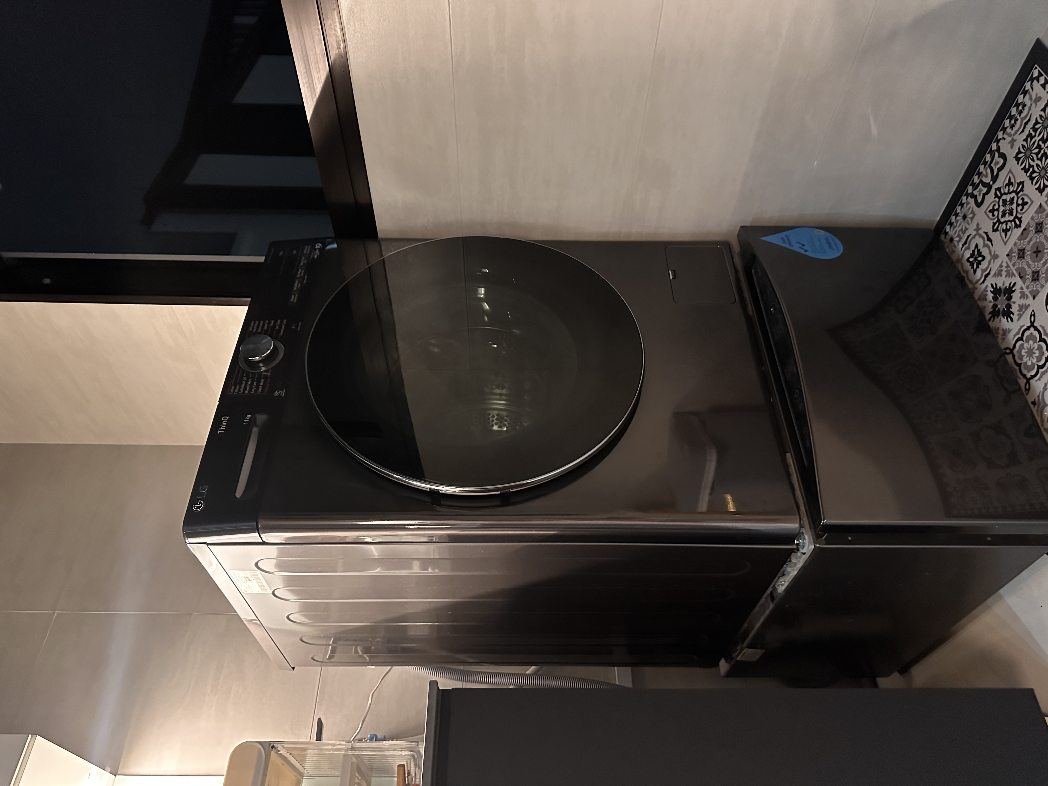 Efficient and Elegant: Our Monochrome Kitchen Design  - Dishwasher, modern appliance, control panel, glass top, sleek design