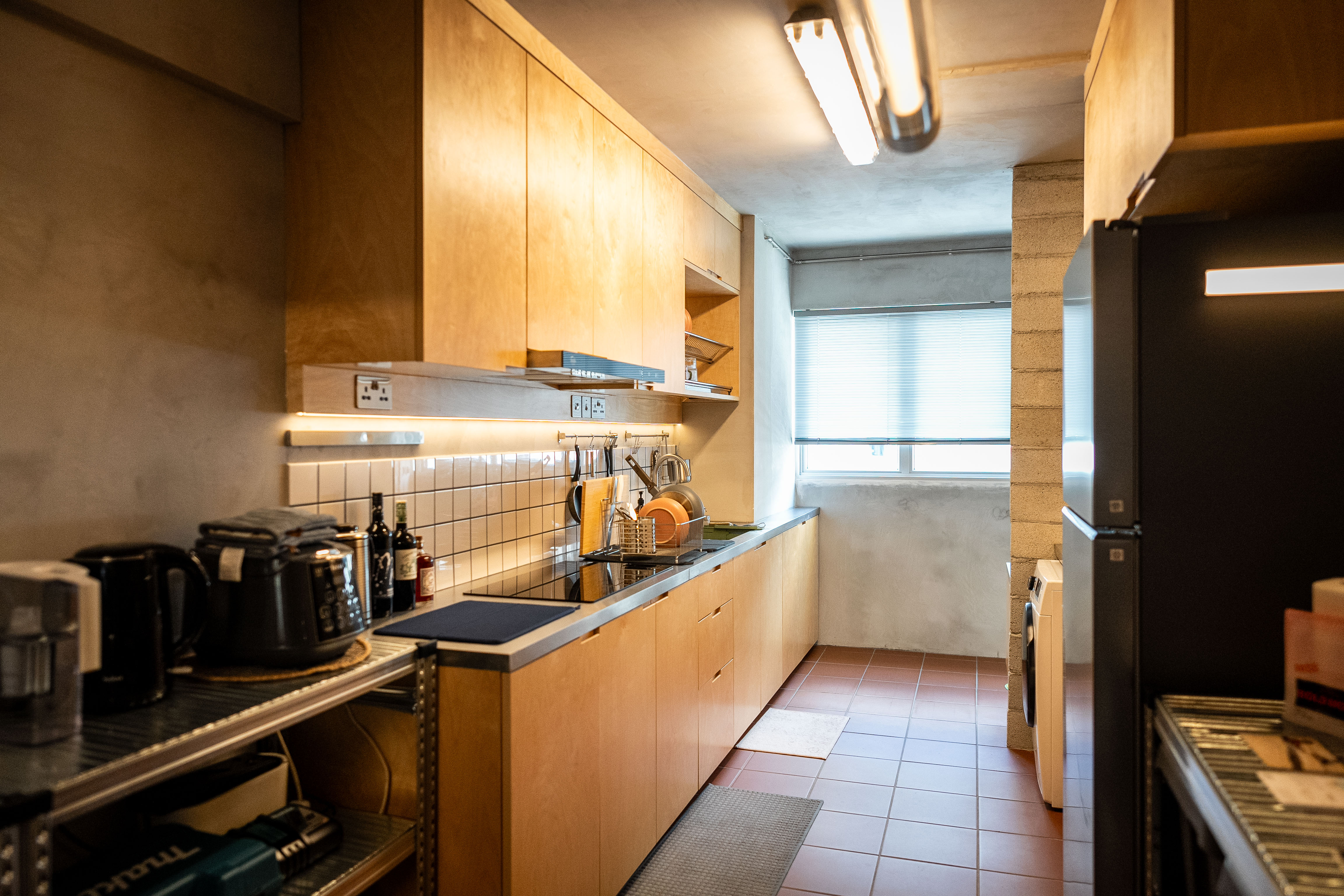 A Coffee Lover's Spacious & Charming Kitchen - Wooden kitchen cabinets, modern design, stainless steel appliances, tiled