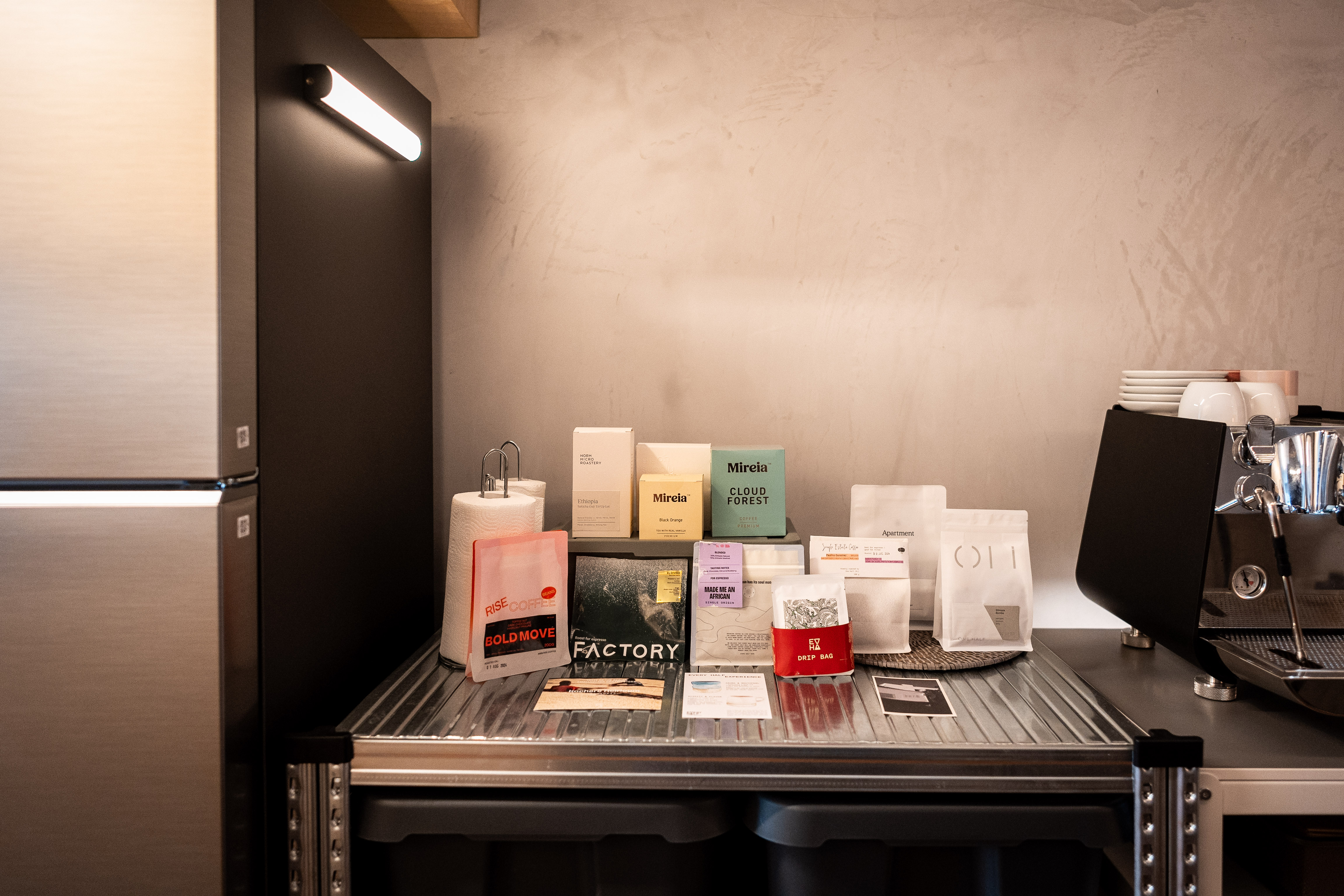 A Coffee Lover's Spacious & Charming Kitchen - Modern kitchen counter, coffee machine, stainless steel surface, coffee beans