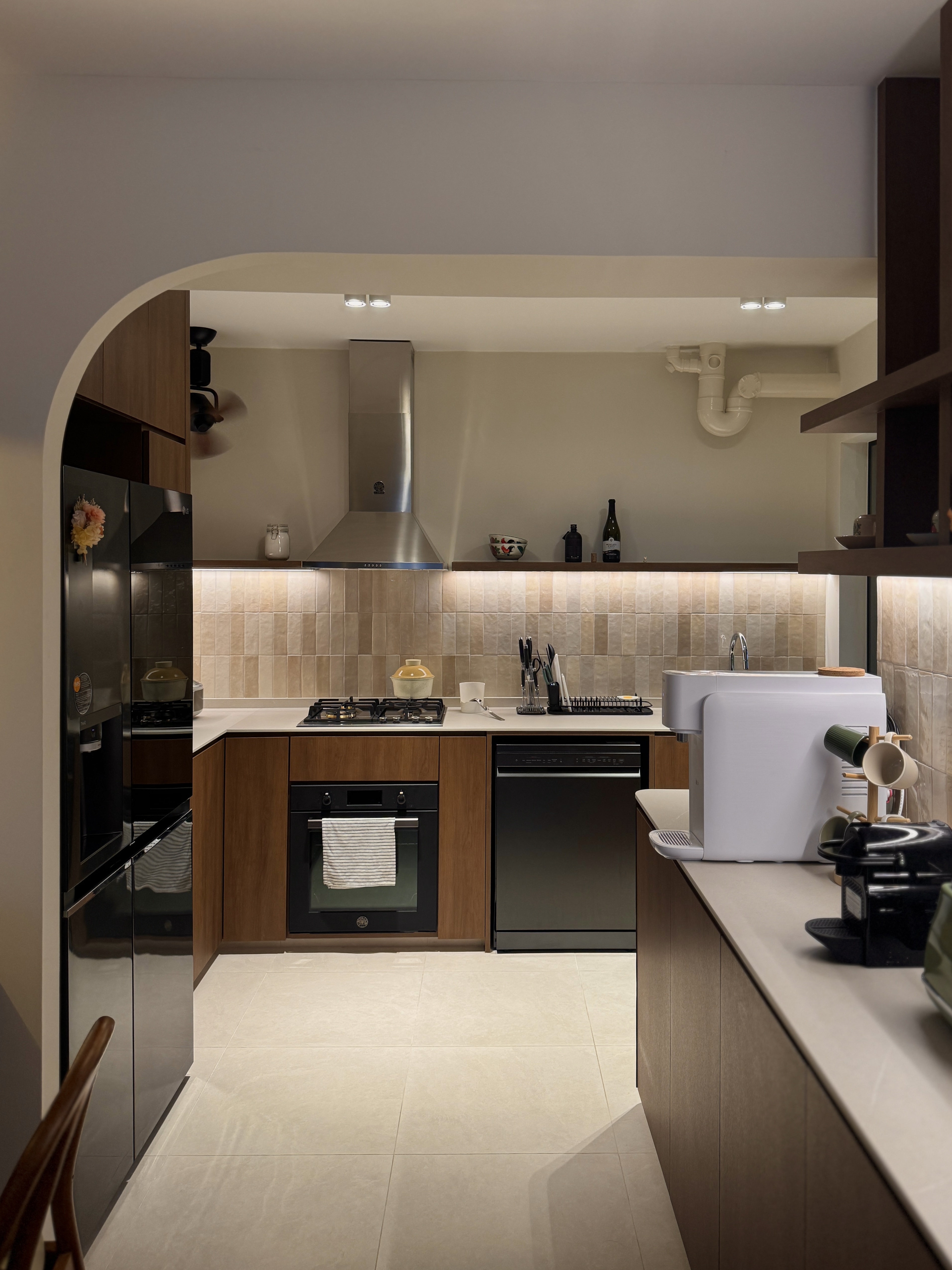 Creating a Functional and Spacious Mid-Century Scandinavian Kitchen - Modern kitchen with stainless steel appliances, beige