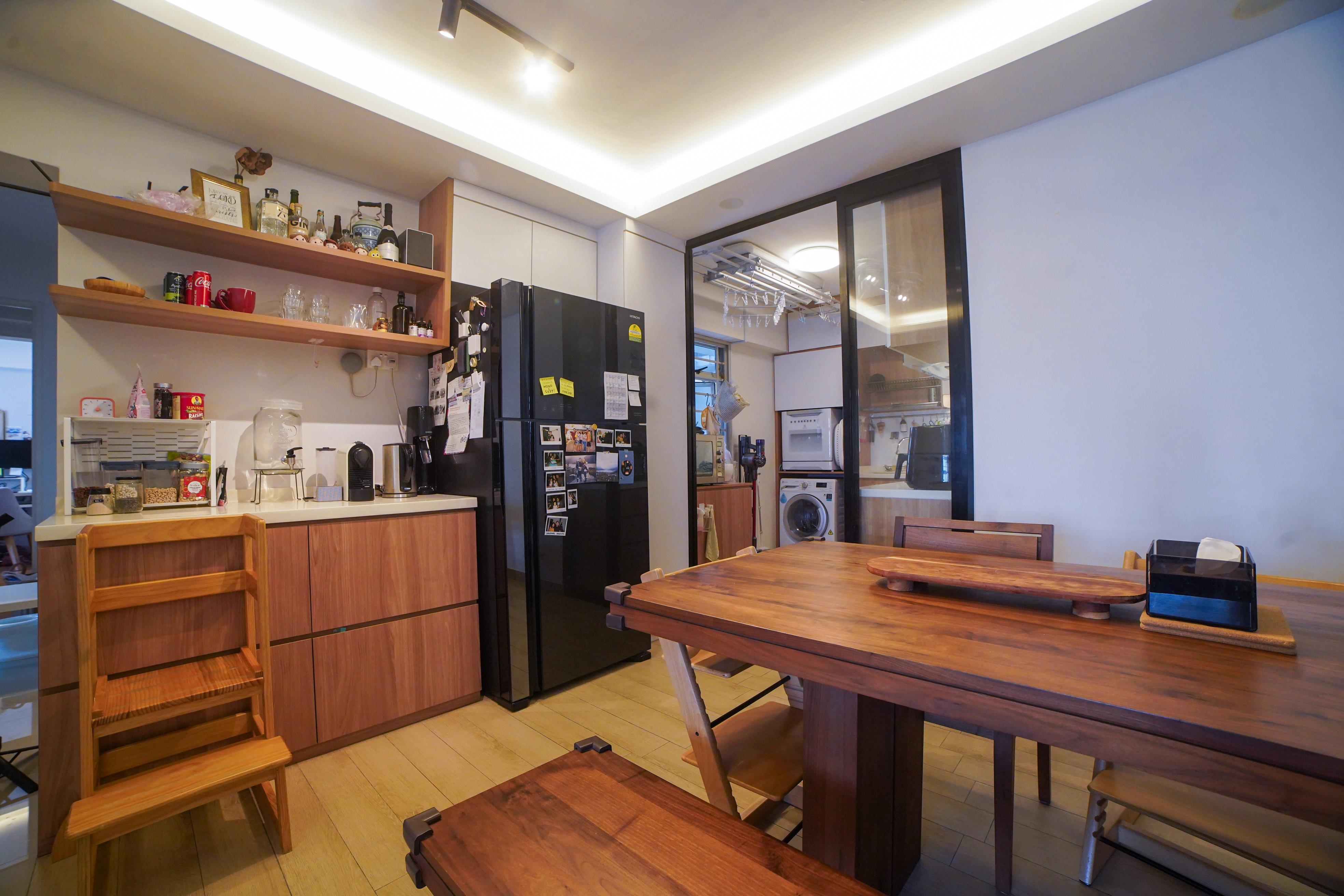 A Compact, Kid-Friendly Kitchen Without a Service Yard - Wooden kitchen island, wooden dining table, wooden chairs, wooden