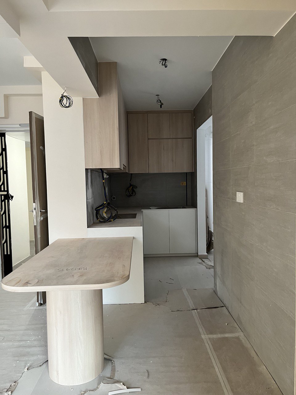 Before & After: Transforming the Impossible of a Small Kitchen Space  - Modern kitchen with light wood cabinets, unfinished