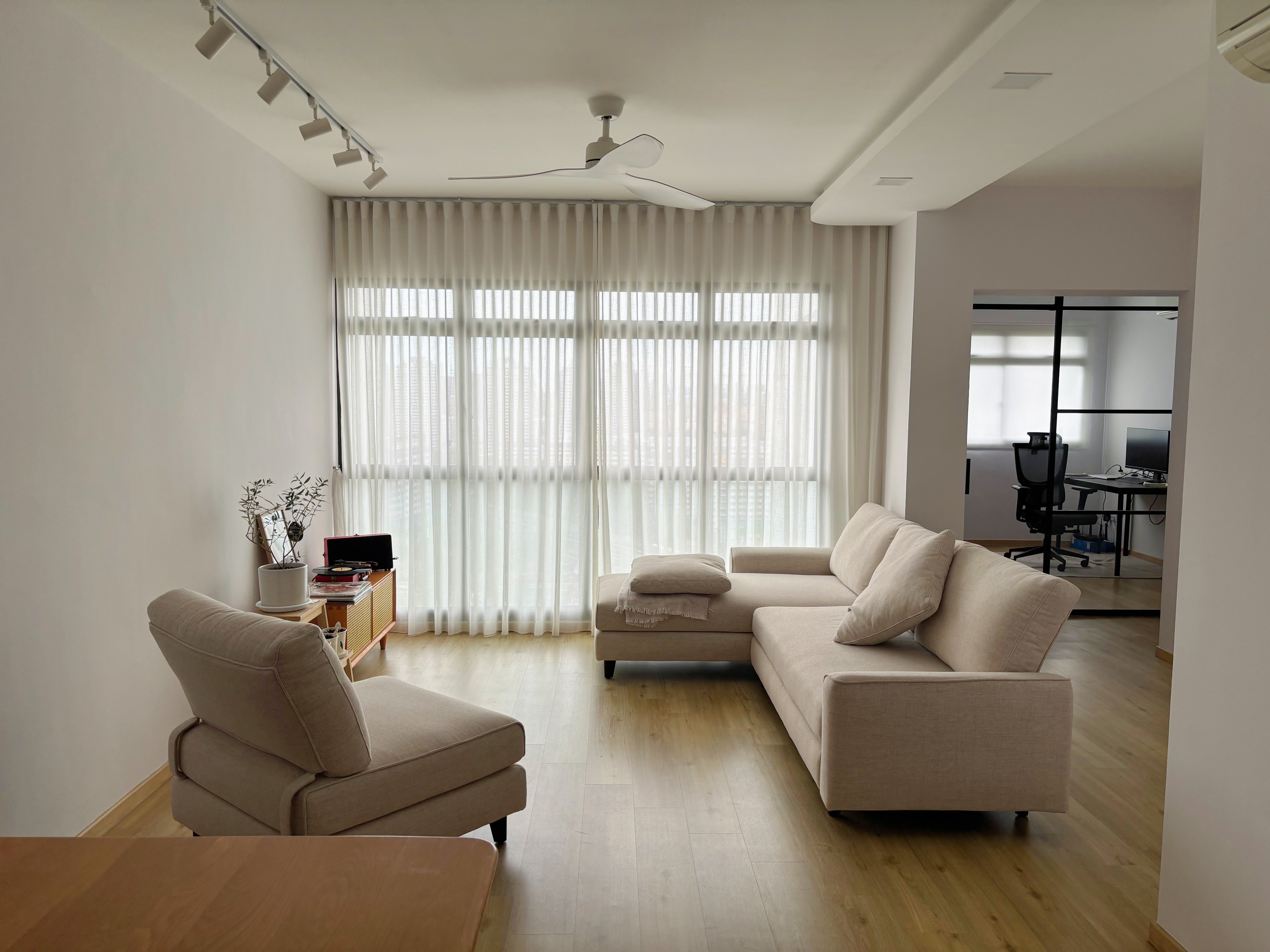 Space to Breathe: Minimalist & Calming 5rm AMK Resale HDB - Modern minimalist living room with beige sofa, wooden coffee
