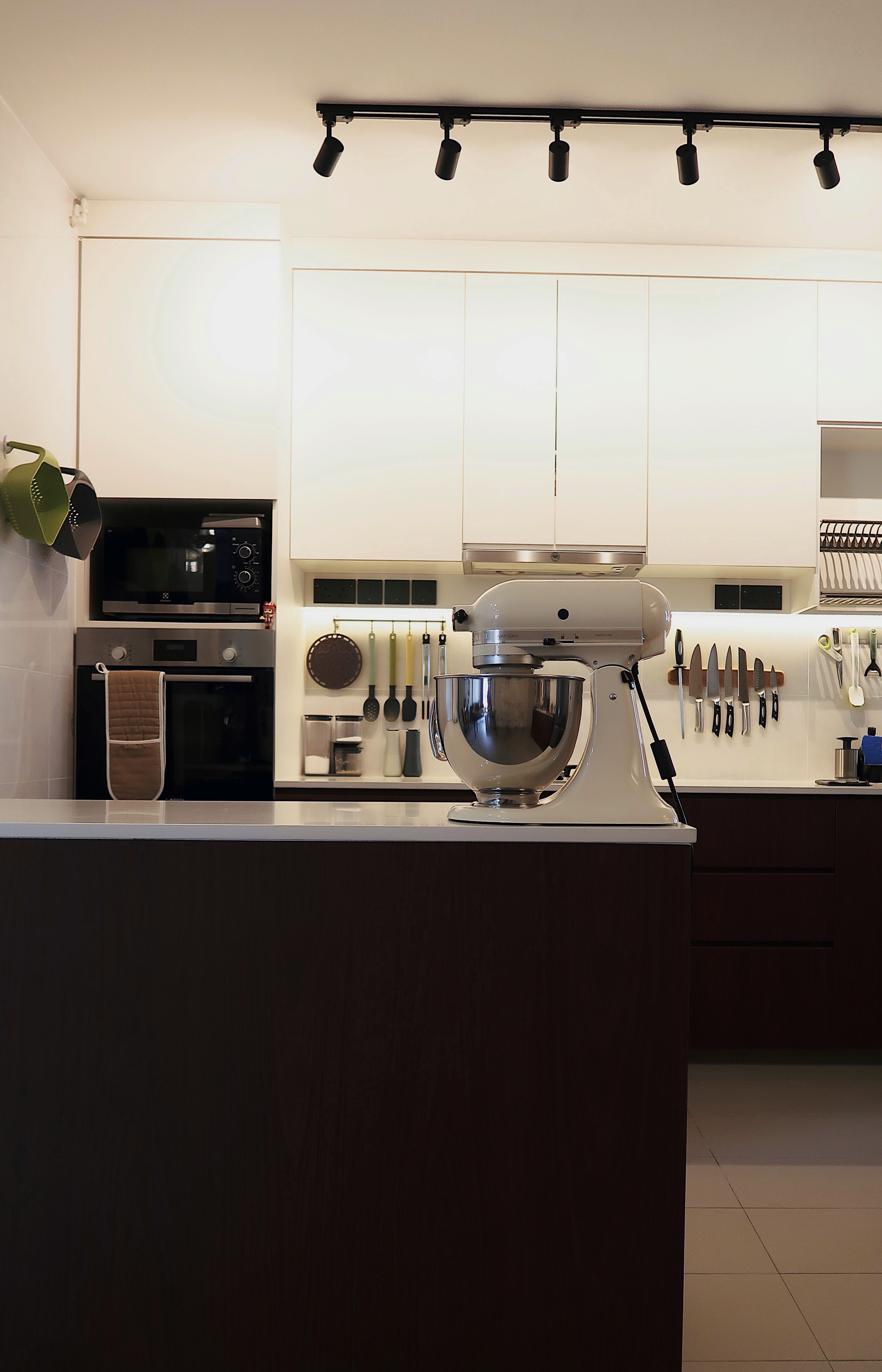 Our Open Concept Kitchen: Rustic Meets Joseph Joseph - Modern kitchen with sleek appliances, white cabinets, stainless steel
