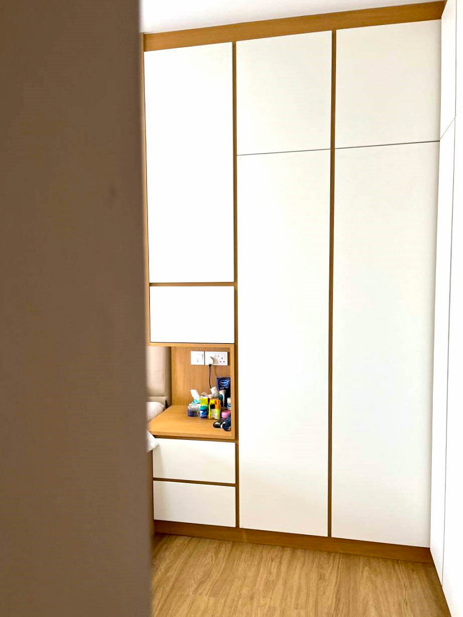 From Vision to Reality: Revamping Our Master Vanity Space - Wooden wardrobe with white doors, minimalist design, integrated