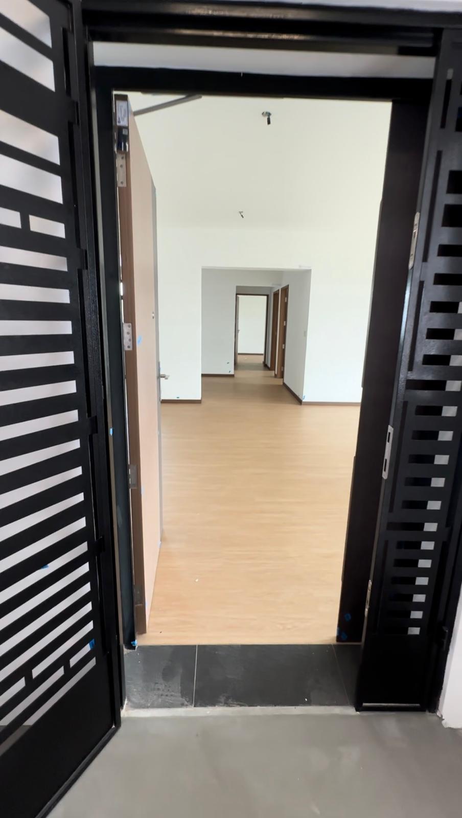 Before & After: Japandi Luxe Entryway - Black and white striped doors, wooden floor, white walls, open doorway, modern