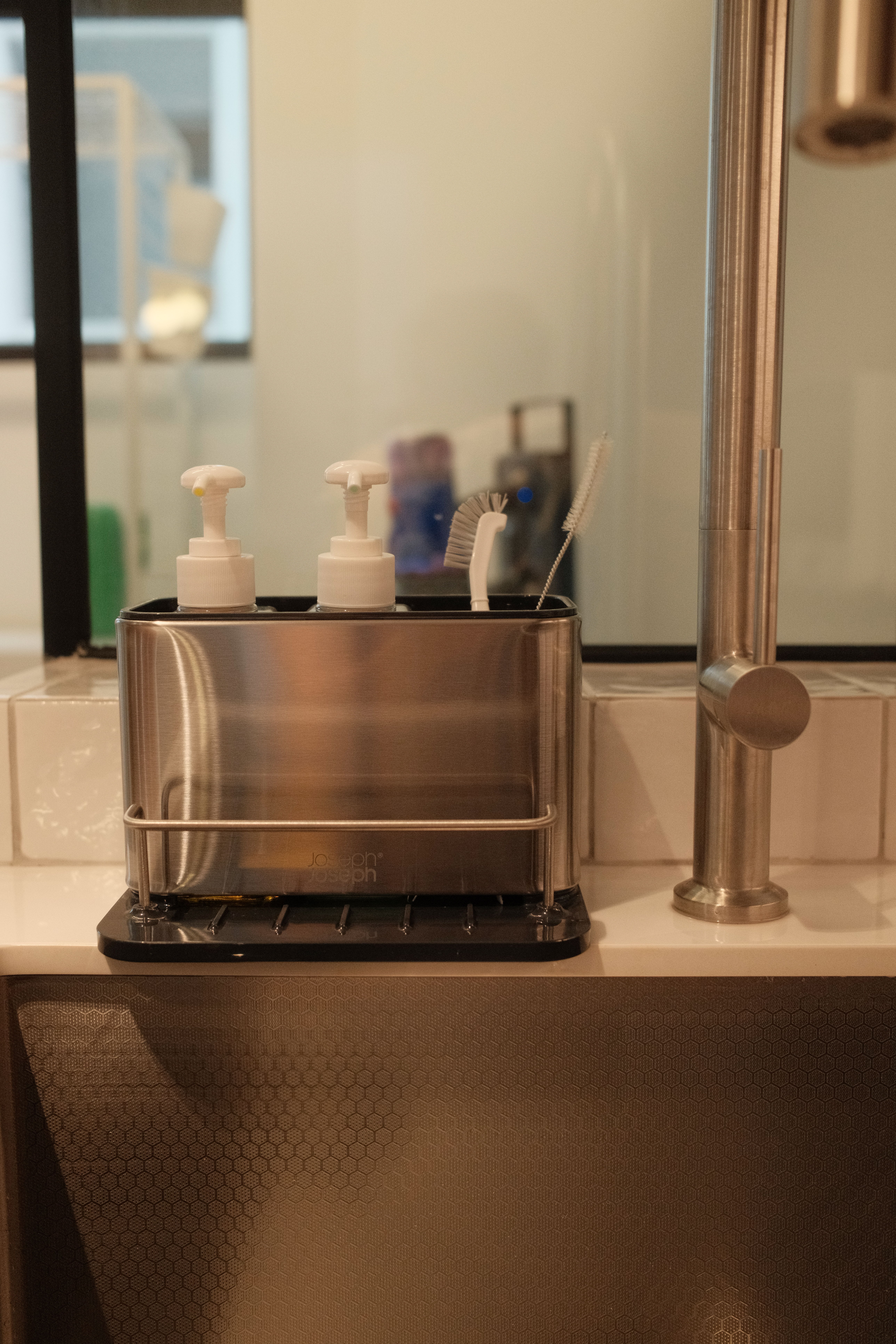 Working Around a Compact Kitchen with an Extended Dry Pantry - silverware dispenser, stainless steel dispenser, white pump