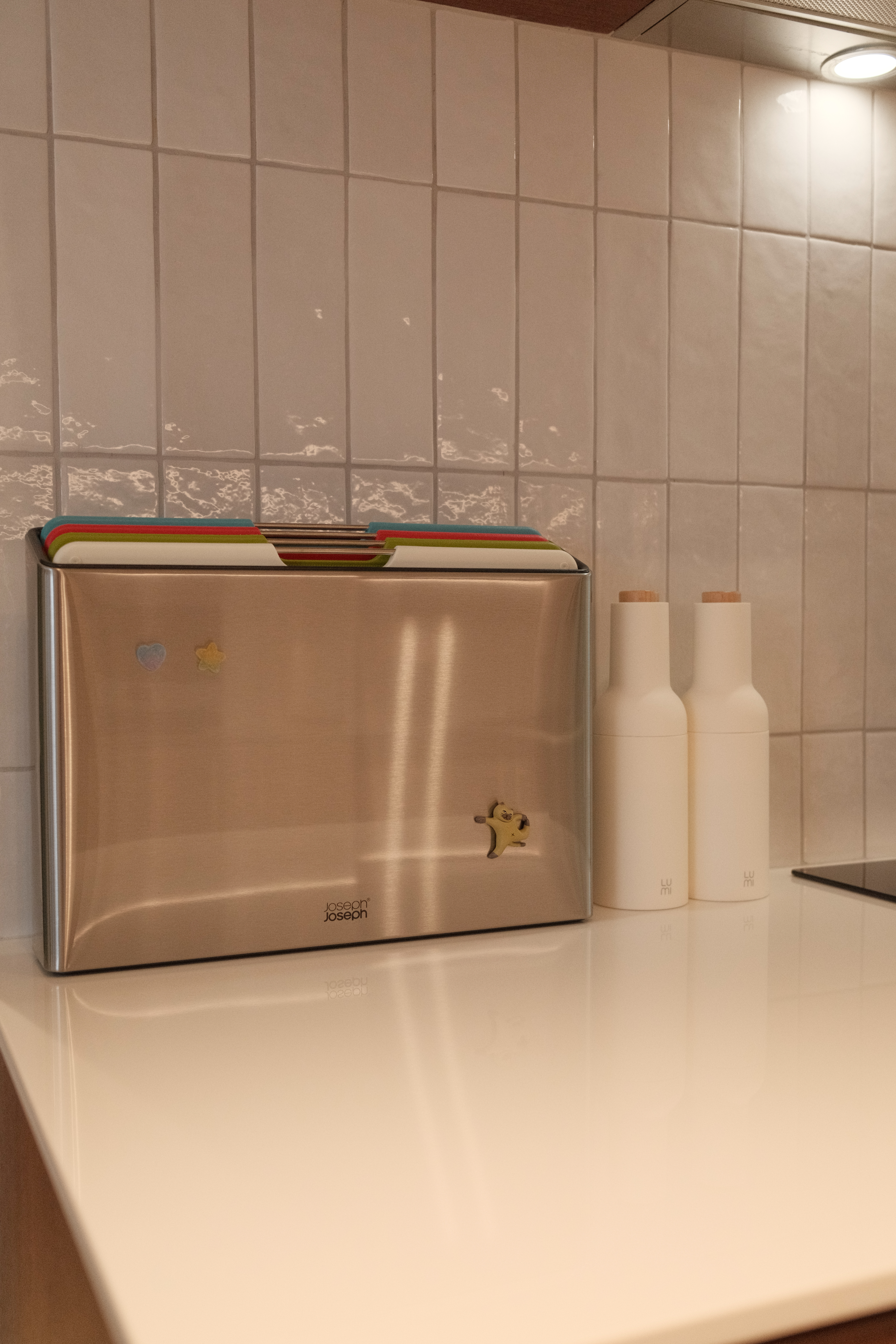 Working Around a Compact Kitchen with an Extended Dry Pantry - silver toaster, stainless steel toaster, kitchen counter