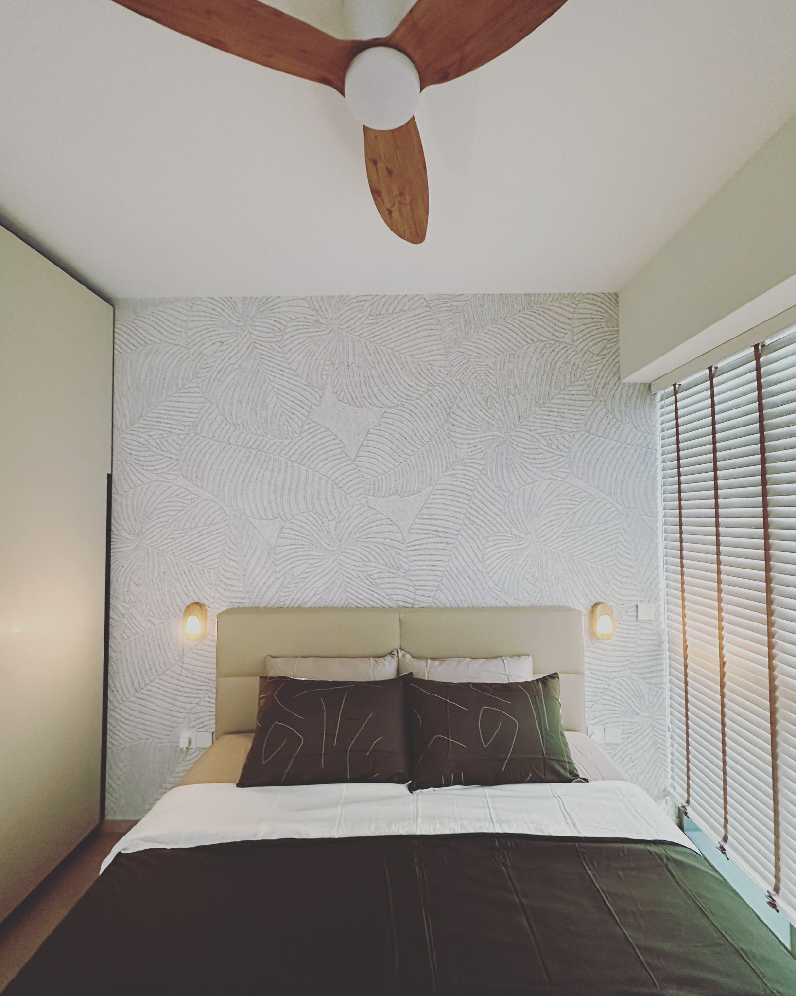 Before / After: Zero Renovation, Maximum Comfort - Modern bedroom with stylish ceiling fan, beige upholstered headboard