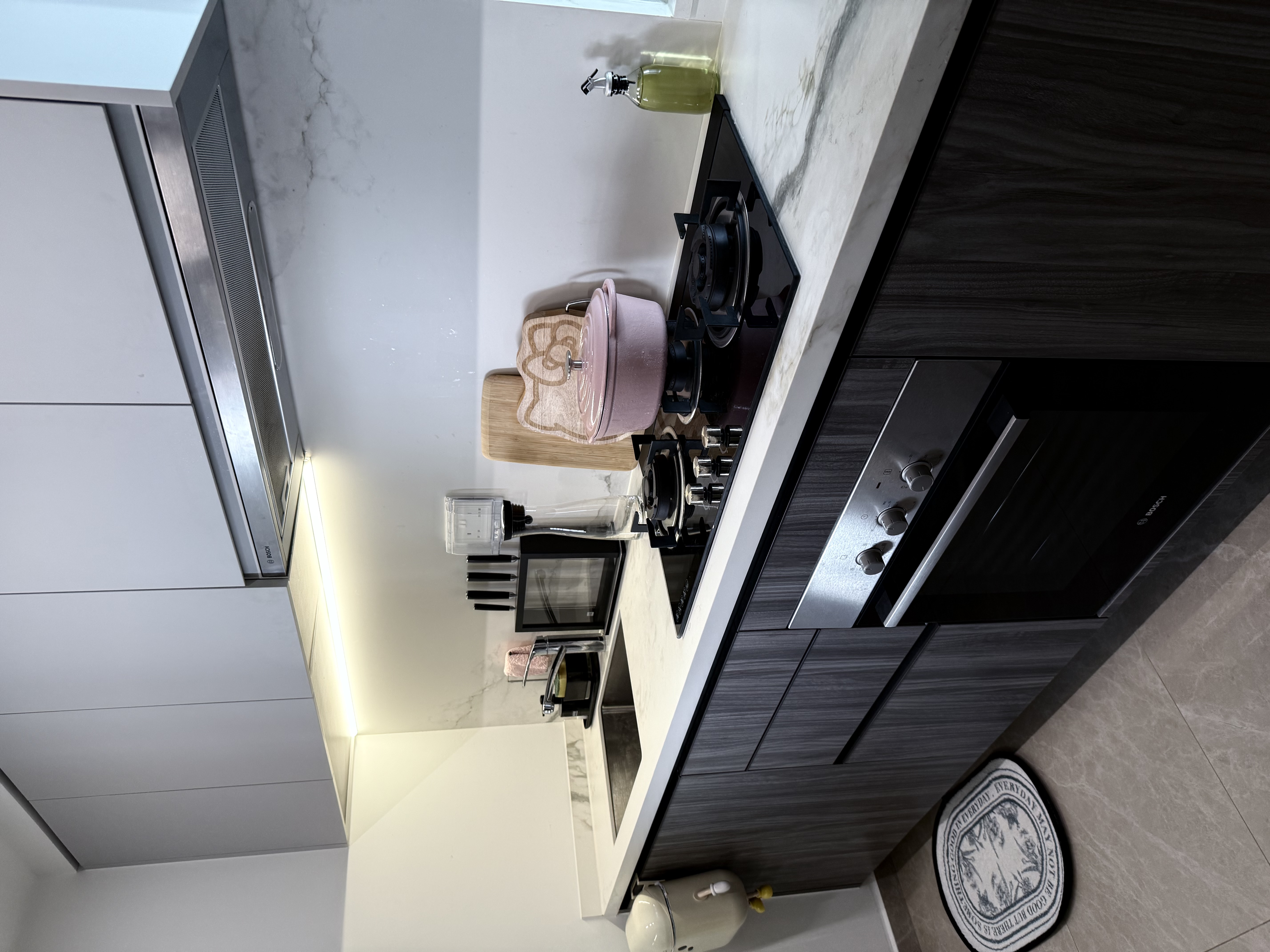 Our Gallery Kitchen: Yay or Nay?  - modern kitchen countertop, stainless steel appliances, wooden cutting board, clear glass