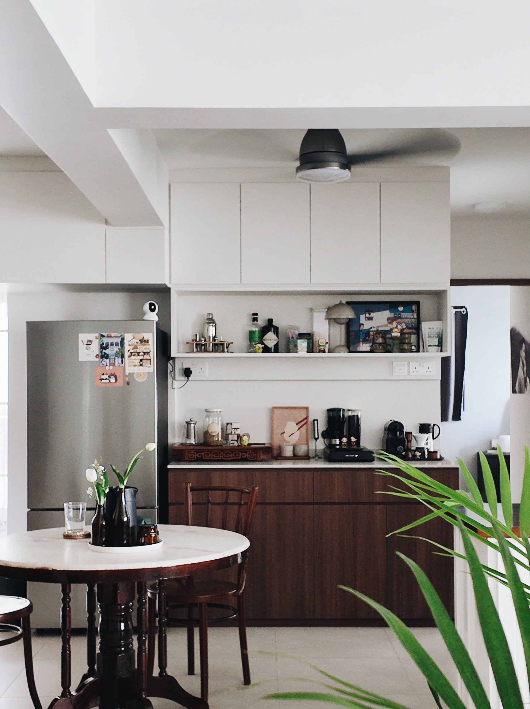 Inside our kopitiam-inspired cozy kitchen  - modern kitchen, minimalist design, white cabinets, wooden countertops, round