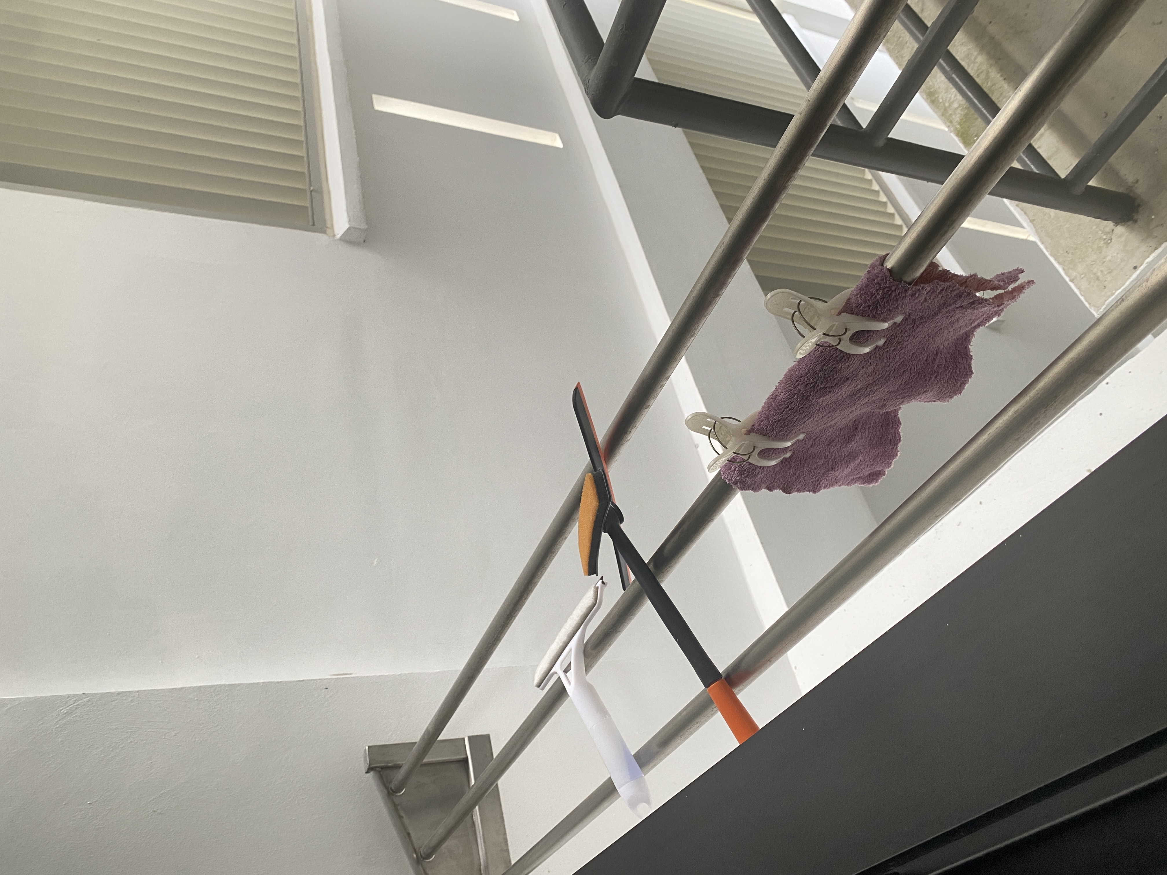 Kitchen: Multifunctional Space Combining Laundry and Cooking Area - metallic ladder, staircase, indoor setting, modern