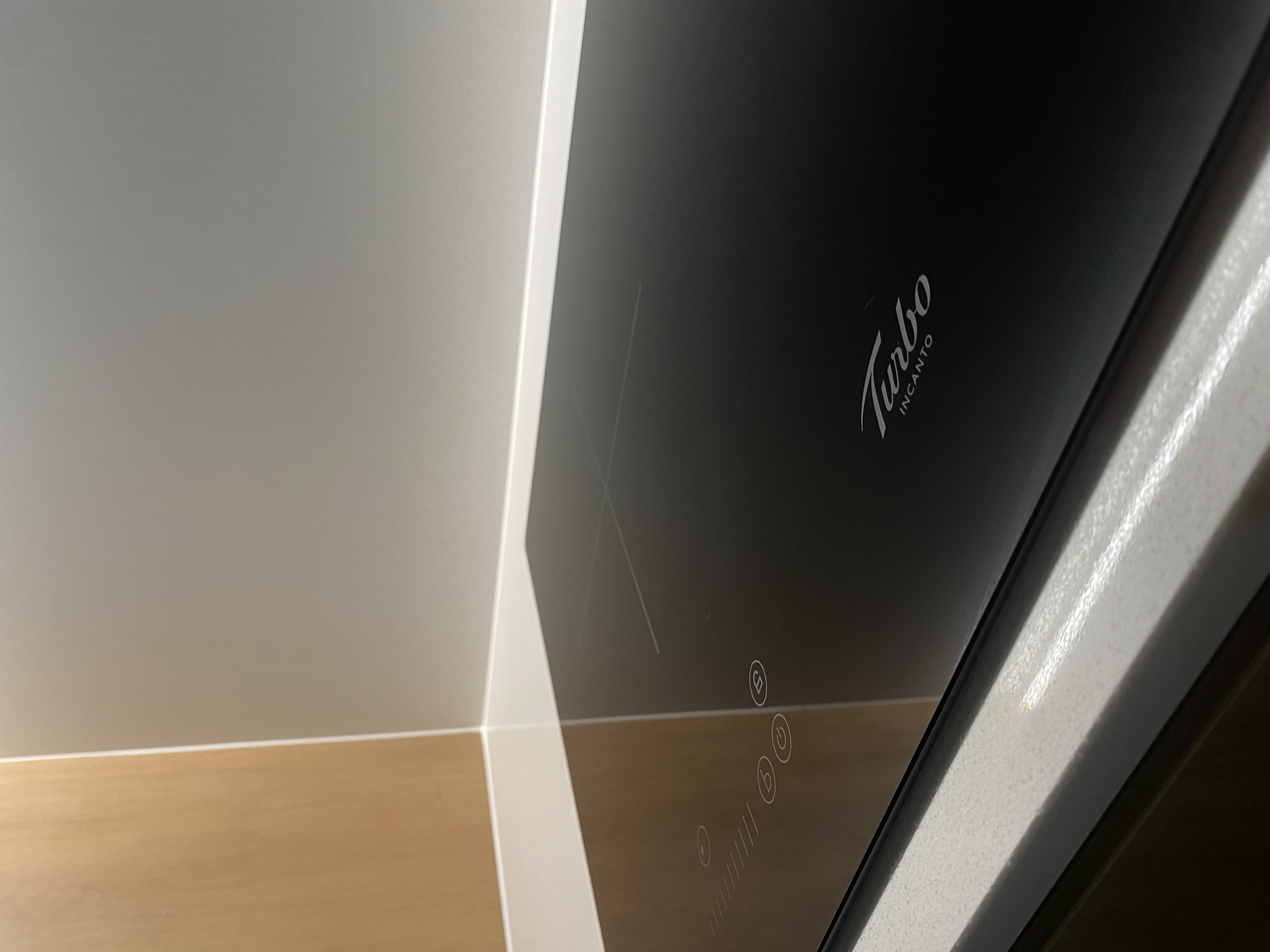 Kitchen: Multifunctional Space Combining Laundry and Cooking Area - Smart oven, sleek design, minimalist, modern kitchen