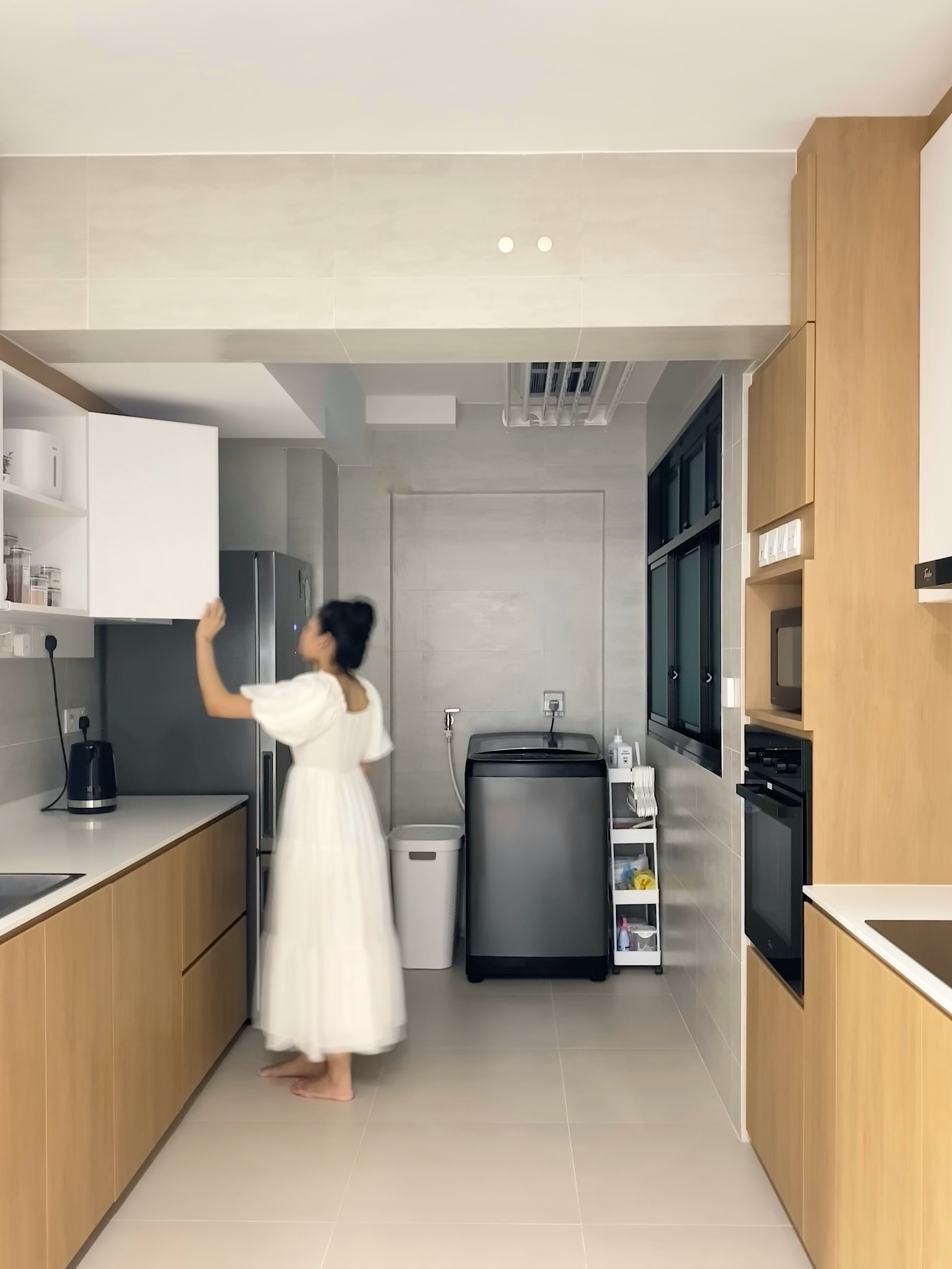 Kitchen: Multifunctional Space Combining Laundry and Cooking Area - Modern kitchen, minimalist design, open shelves, sleek