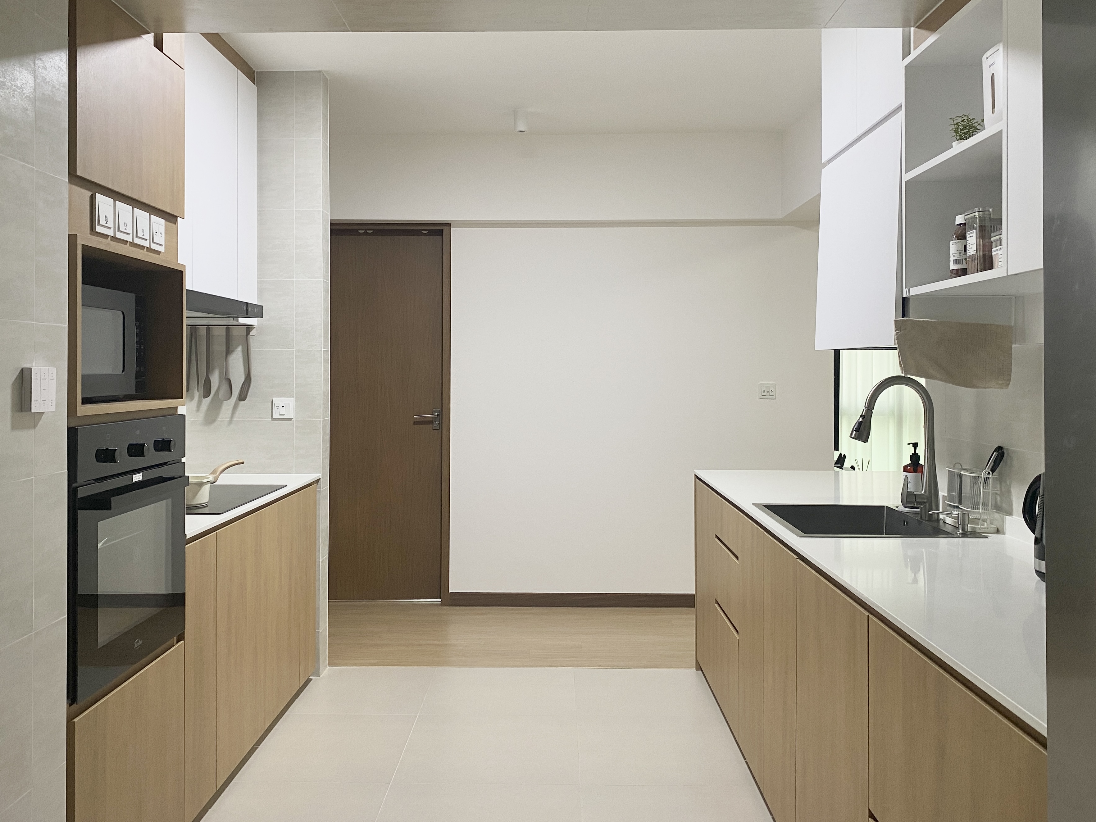 Kitchen: Multifunctional Space Combining Laundry and Cooking Area - Wooden cabinets, modern kitchen, minimalist design, sleek