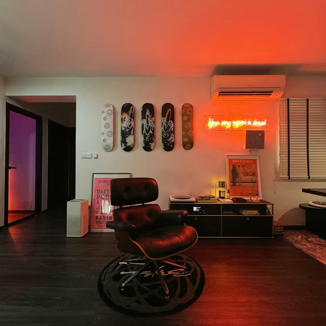 $31K Renovation Budget 5-Room HDB Mid-Century & Eclectic - Modern lounge room, neon sign, skateboards, black leather chair