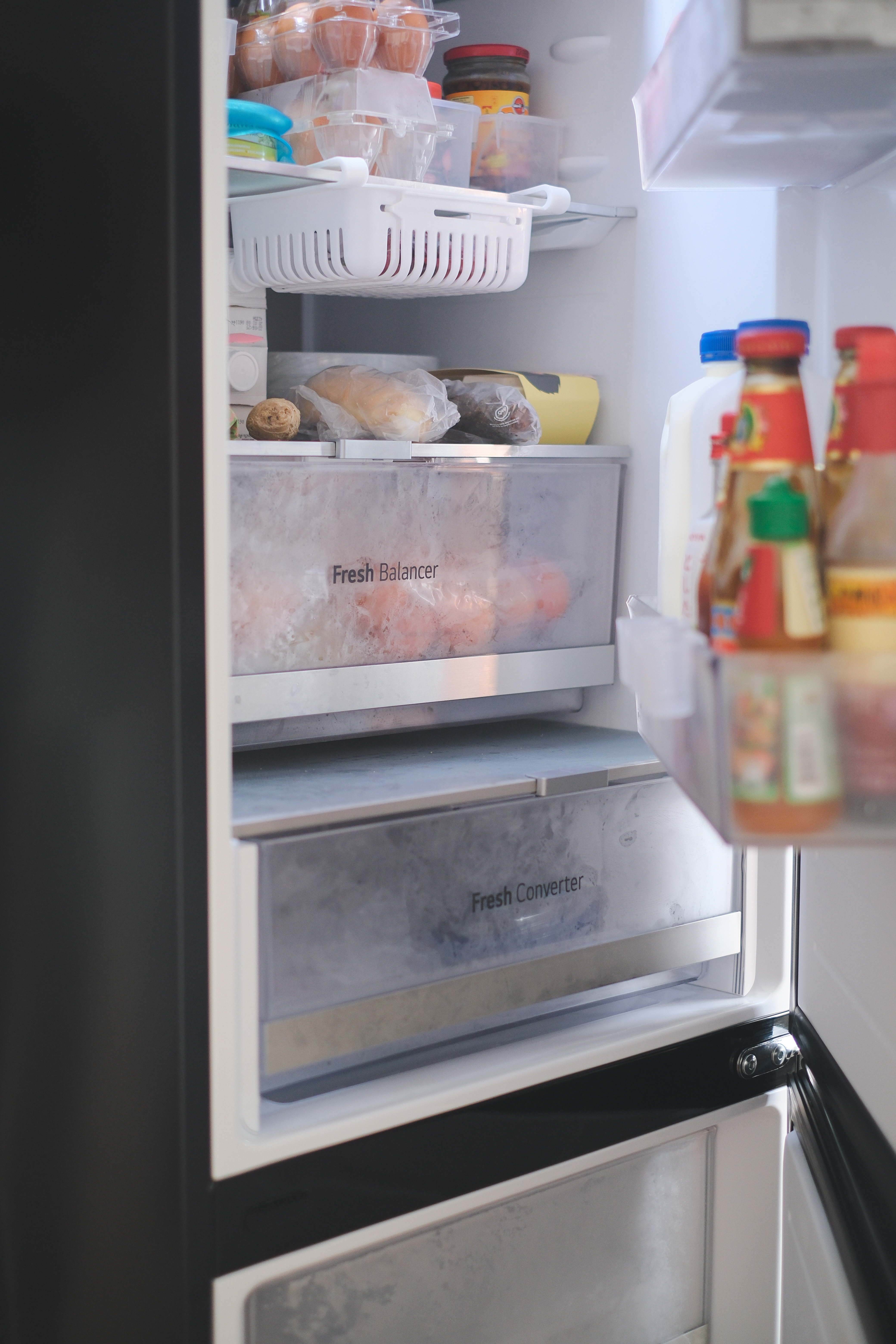 Clean and Functional: A Kitchen Designed with Smart Storage Solutions - Refrigerator door, food storage, refrigerator