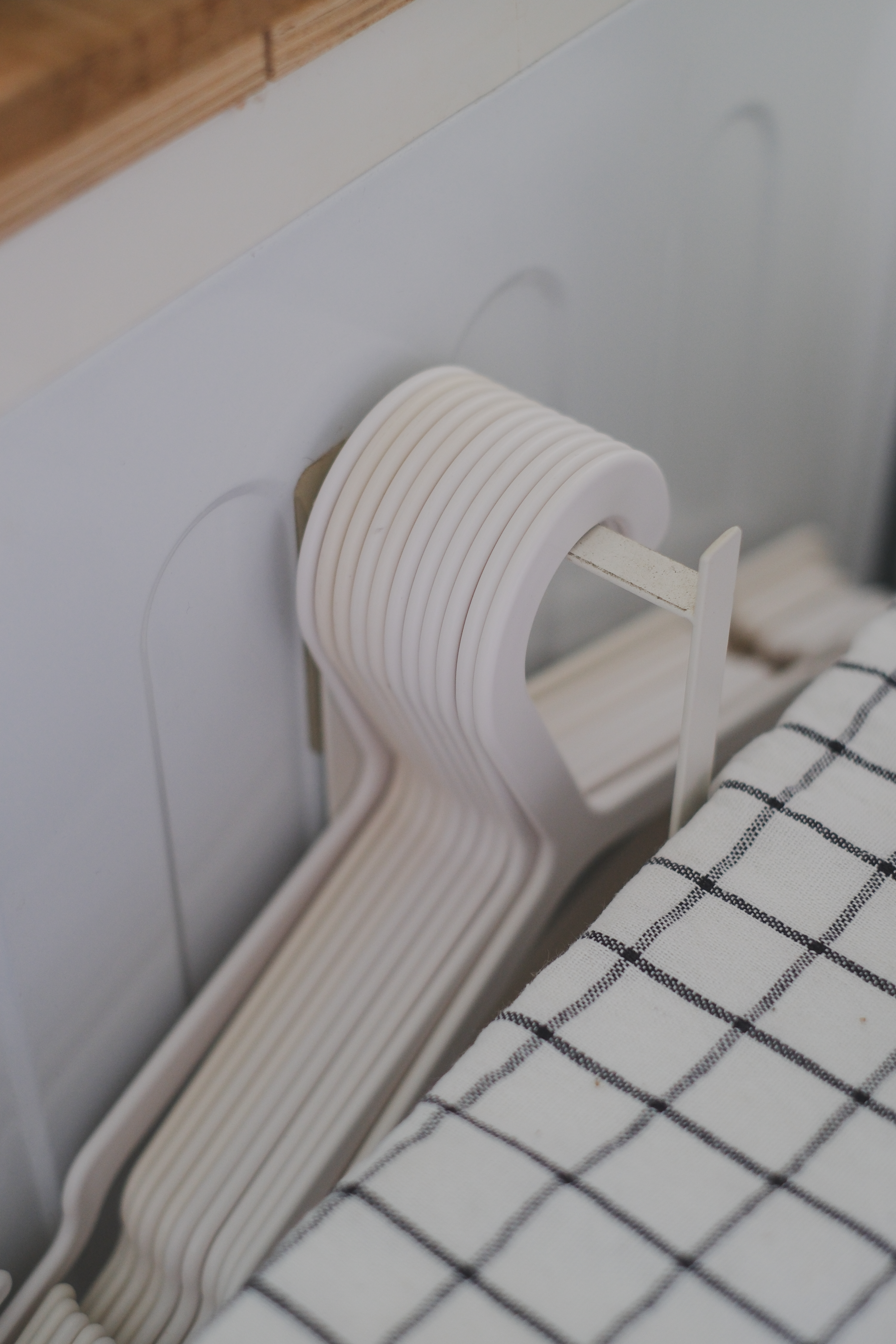 Clean and Functional: A Kitchen Designed with Smart Storage Solutions - White radiator, stacked heating elements, modern