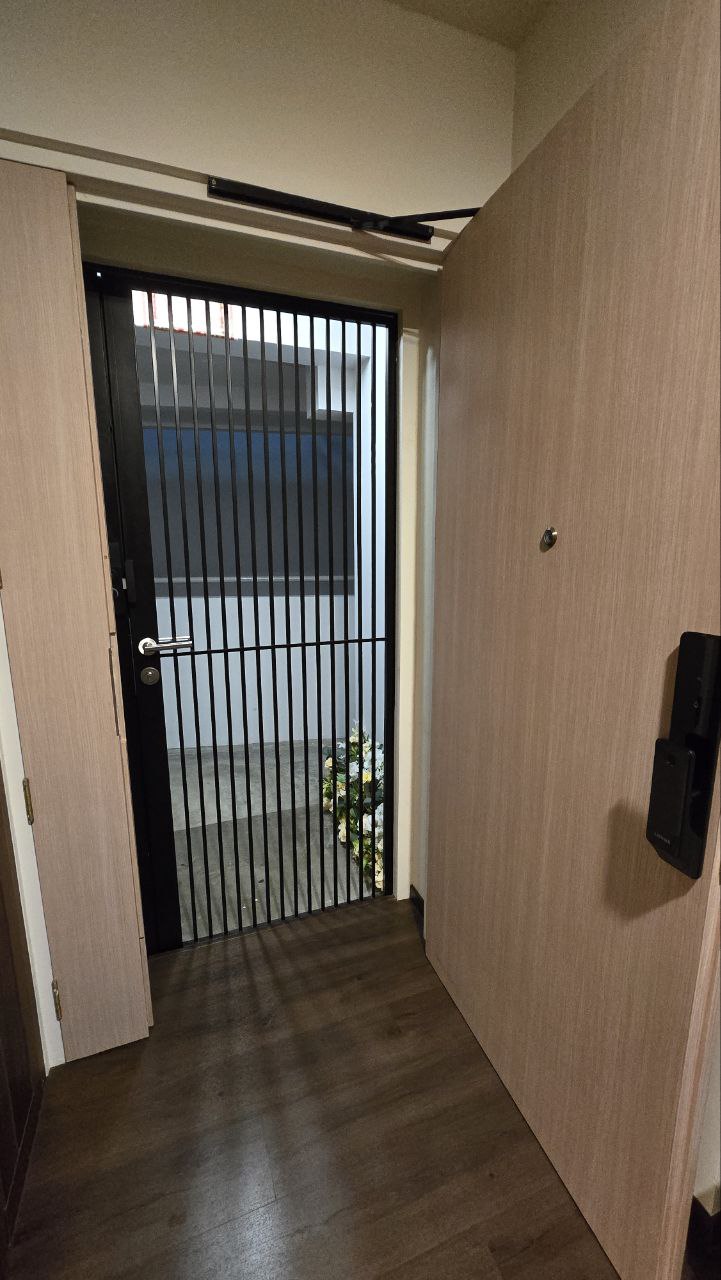 How to make your HDB Door look like Condo - Wooden door, black metal gate, interior hallway, wooden floor, modern design