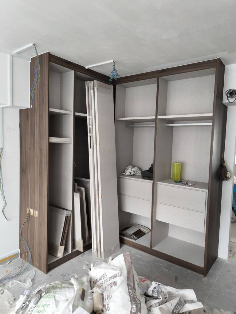 Bedroom: we "shifted" the position of our master bedroom door - Wooden wardrobe with open doors, unfinished interior, exposed
