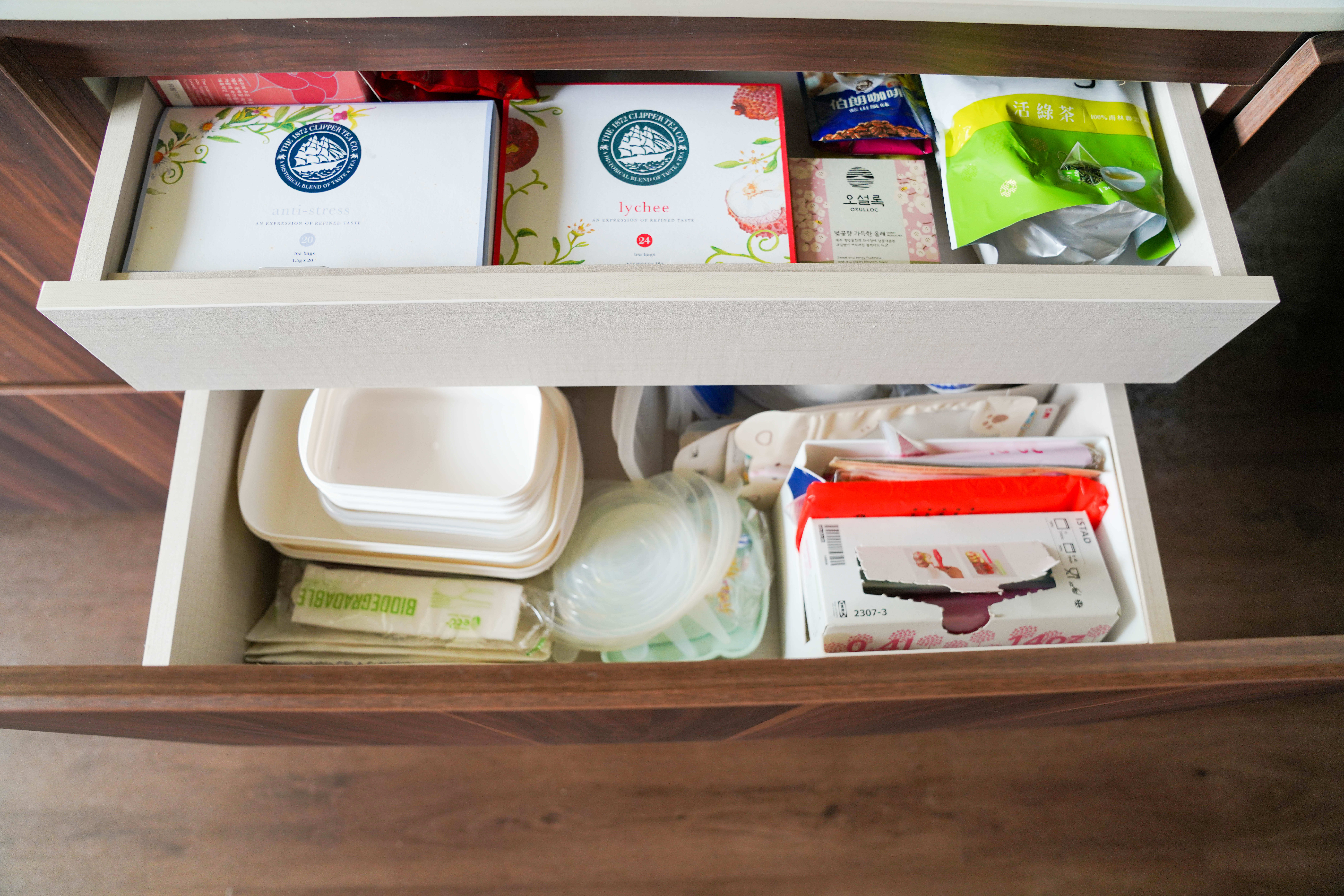 A Kitchen of Thoughtful Details - Organized drawer, neatly arranged items, travel essentials, travel kit, toiletries