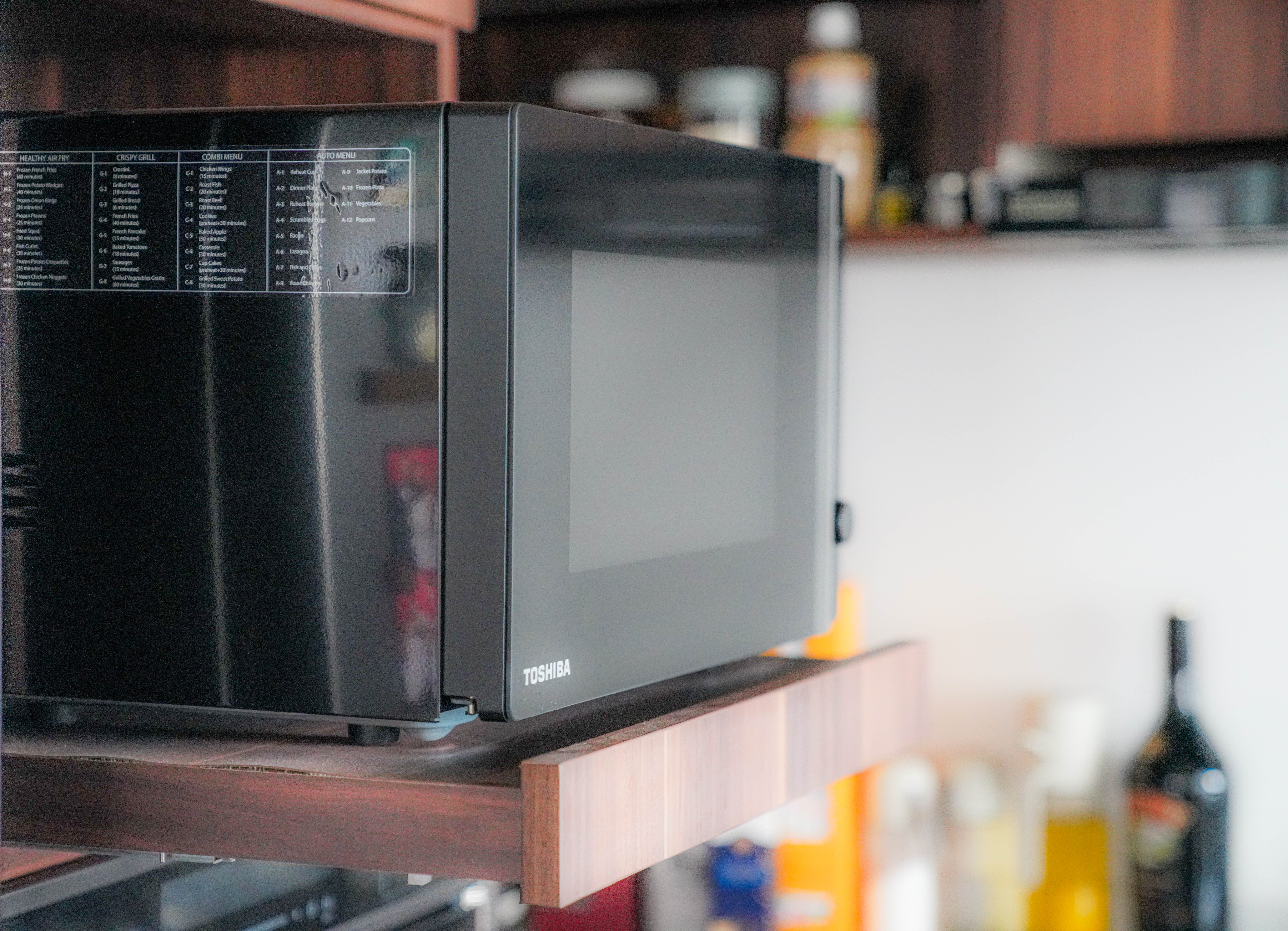 A Kitchen of Thoughtful Details - Microwave, kitchen, black, Toshiba, stainless steel, control panel, menu, food preparation