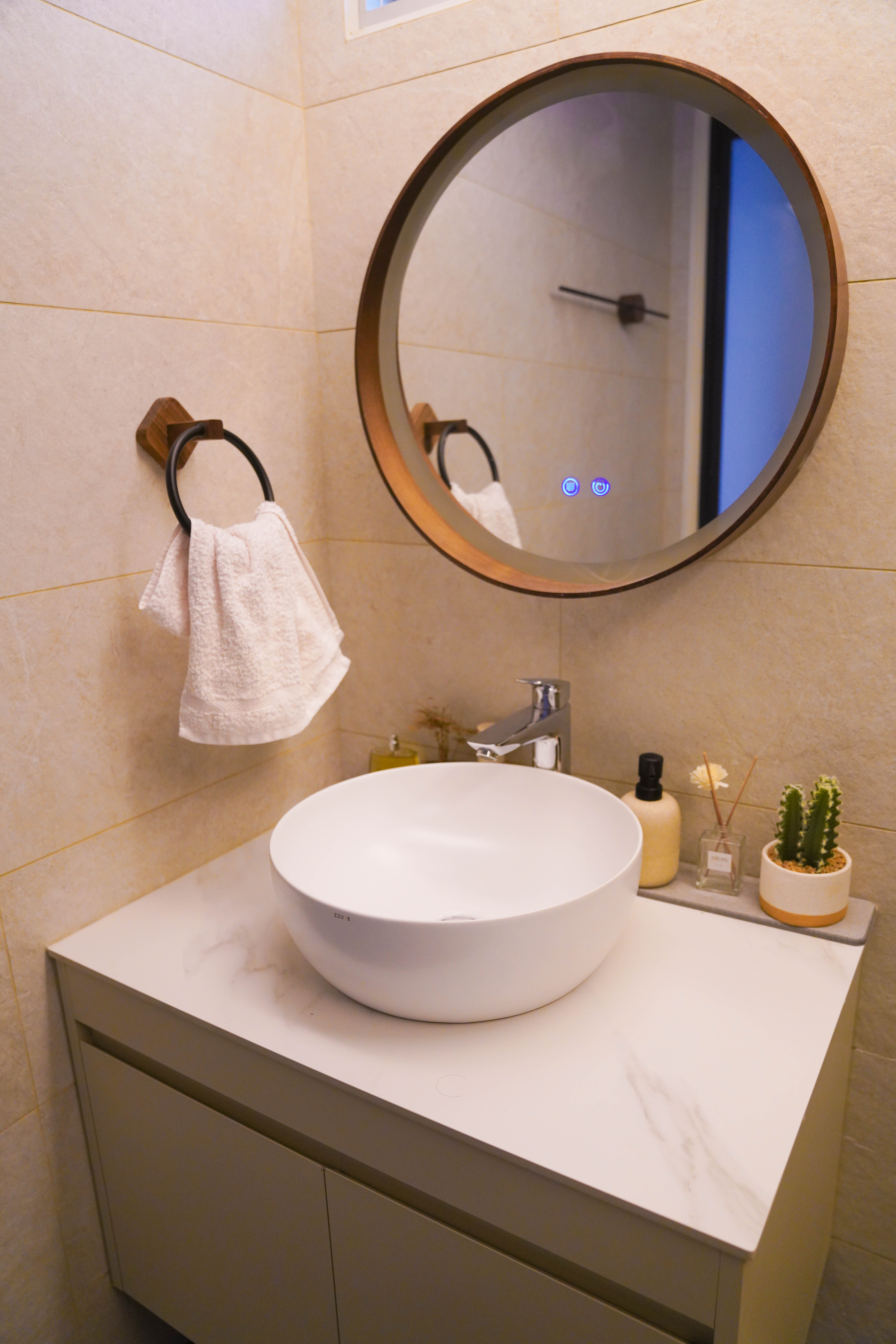 Resort-like Common Bathroom (+Smart Toilet @ $450) - Round mirror with wooden frame, white bathroom vanity, white oval sink
