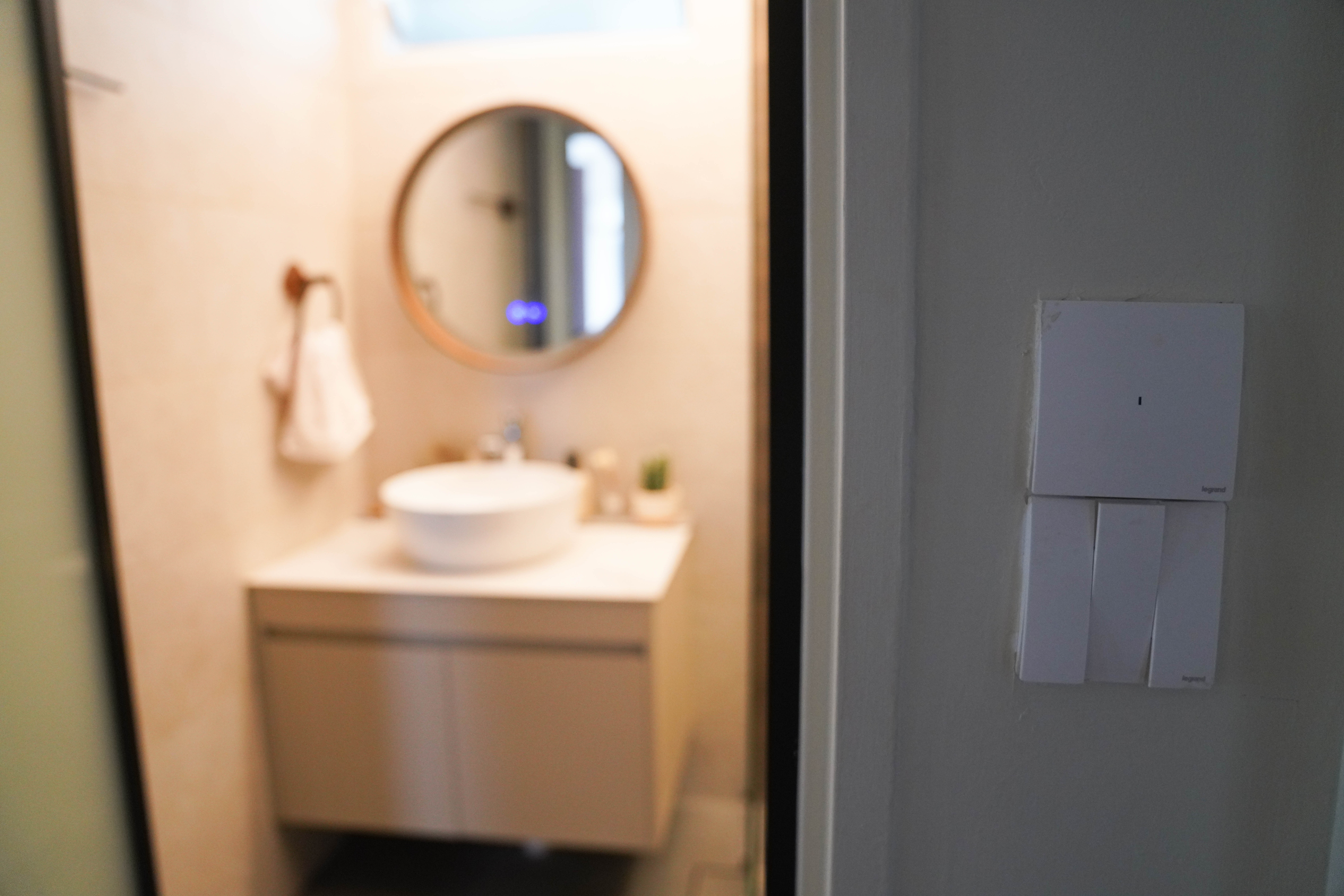 Resort-like Common Bathroom (+Smart Toilet @ $450) - Modern bathroom interior, minimalist design, white vanity, round mirror