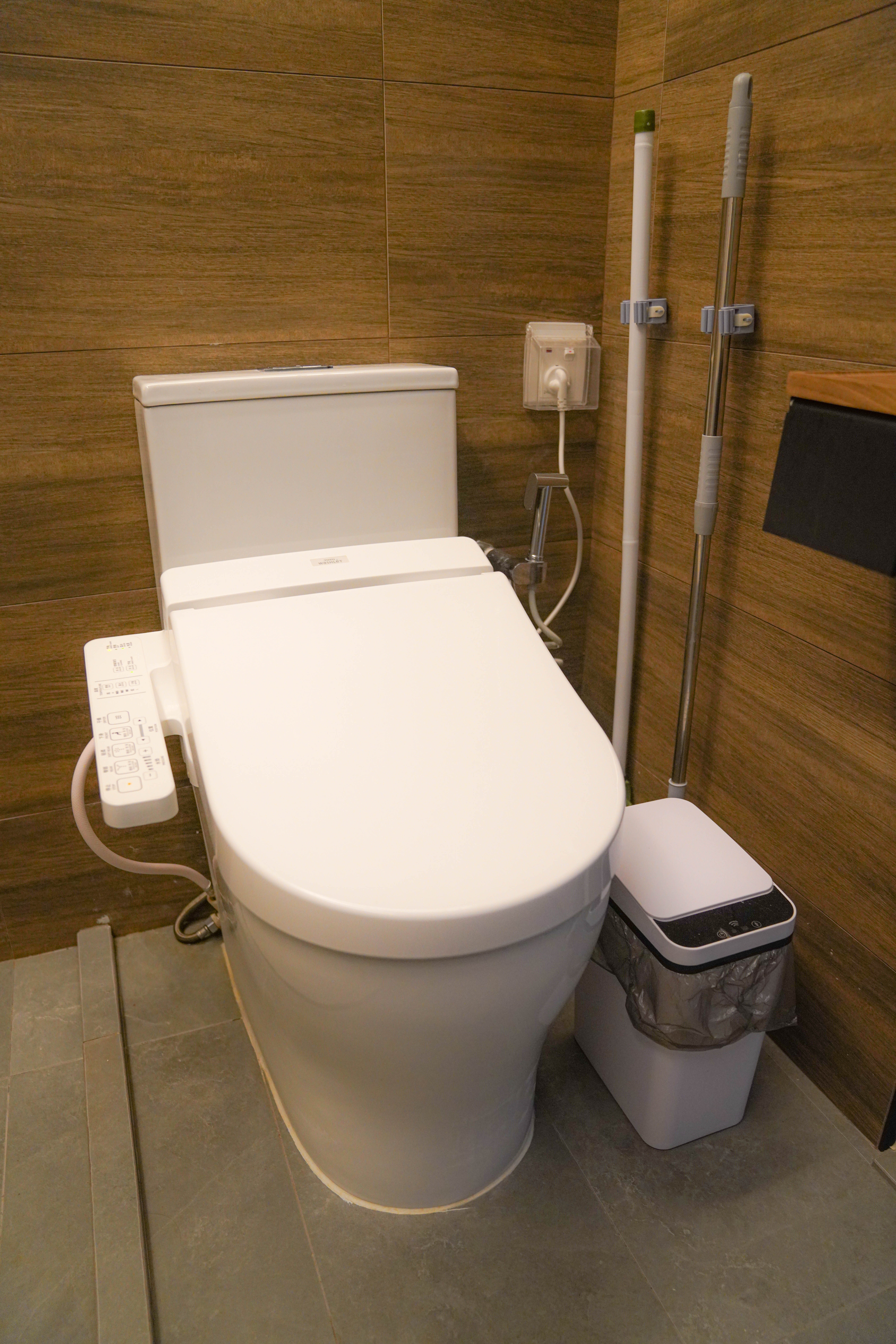 Resort-like Common Bathroom (+Smart Toilet @ $450) - Modern bathroom, toilet, white ceramic, tiled floor, gray tiles, toilet
