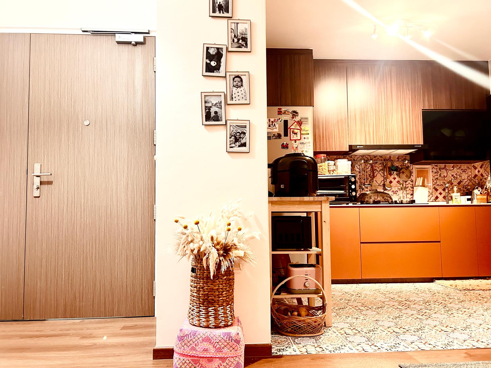 Airy and Inviting: A $26K Bohemian Mediterranean 4-RM BTO - Wooden door, framed photos, kitchen appliances, wooden cabinets