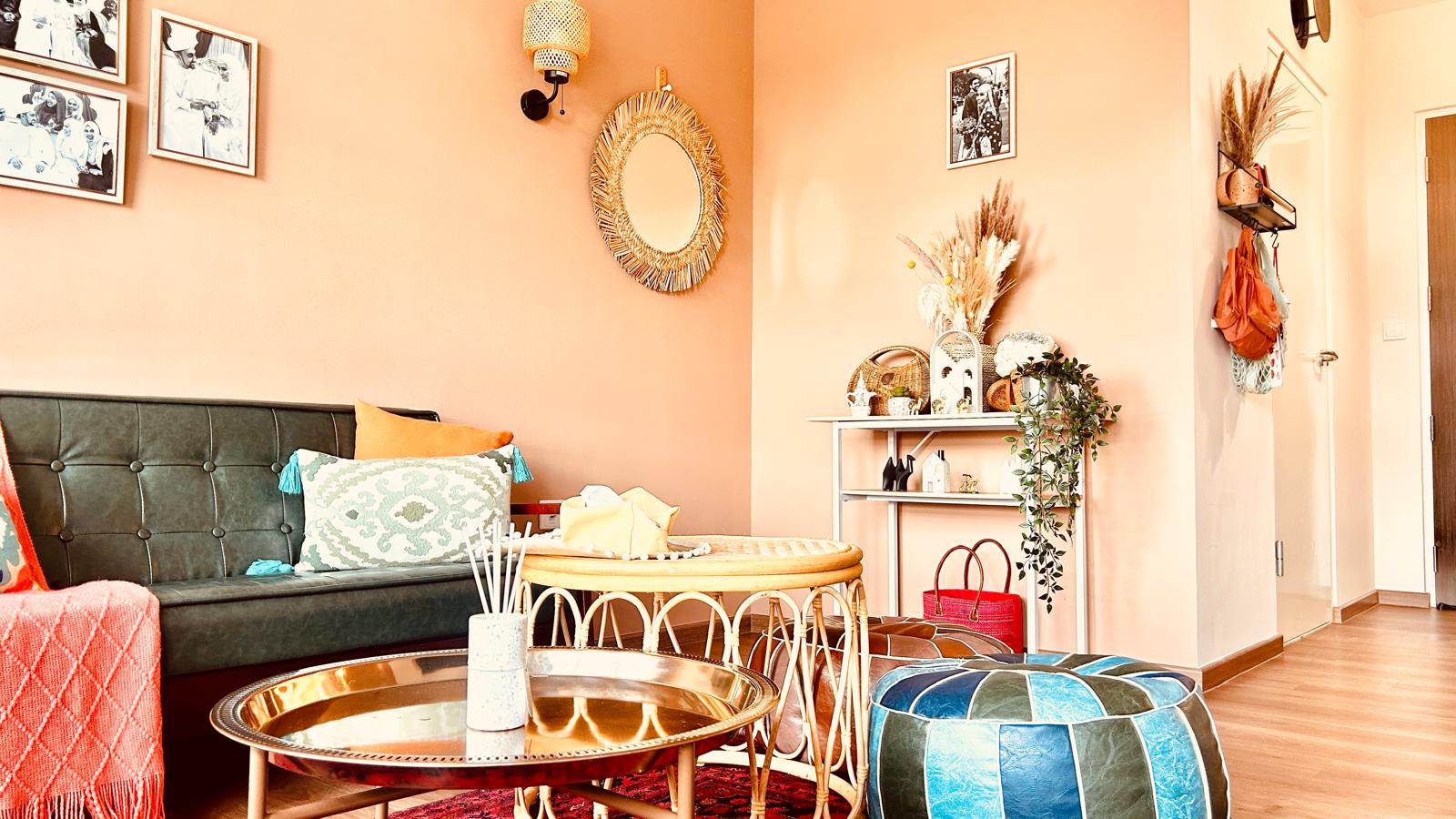 Airy and Inviting: A $26K Bohemian Mediterranean 4-RM BTO - Couch with decorative pillows, orange throw blanket, round coffee
