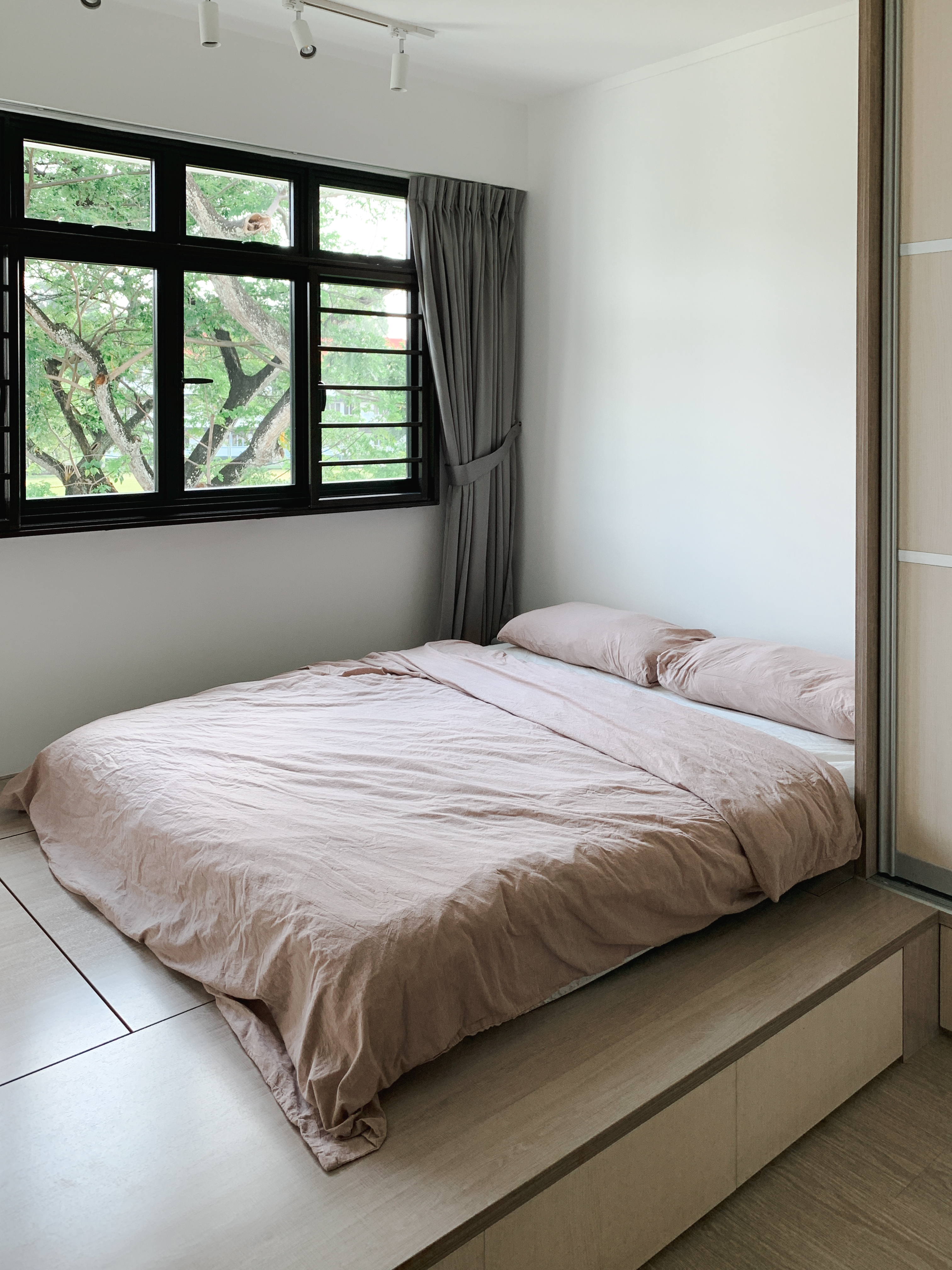 Japandi HDB Home with Unblocked Views: Renovated for Just $15K! - Modern minimalist bedroom, large window with green foliage