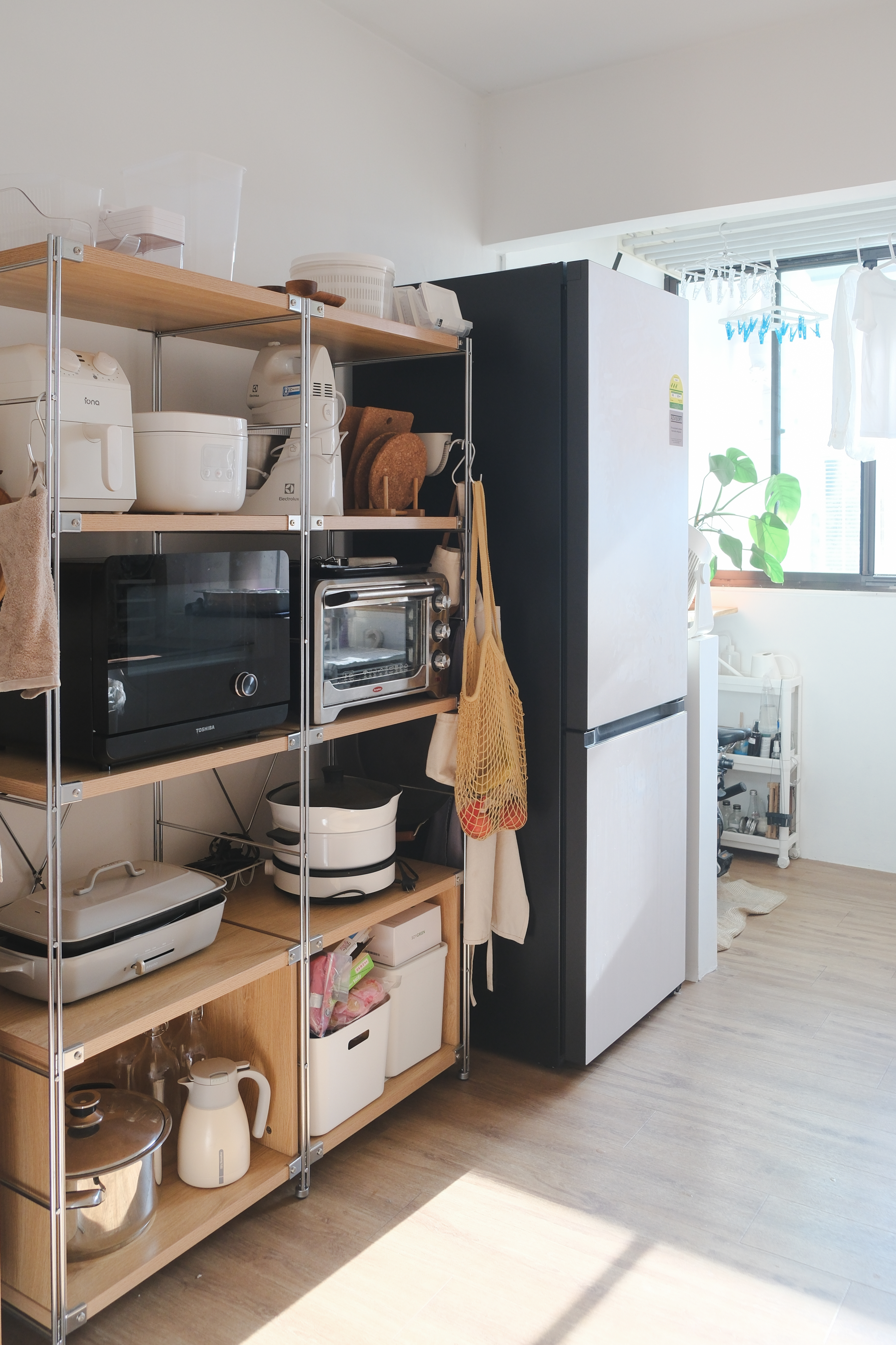 Japandi HDB Home with Unblocked Views: Renovated for Just $15K! - Wooden kitchen shelves, modern appliances, white