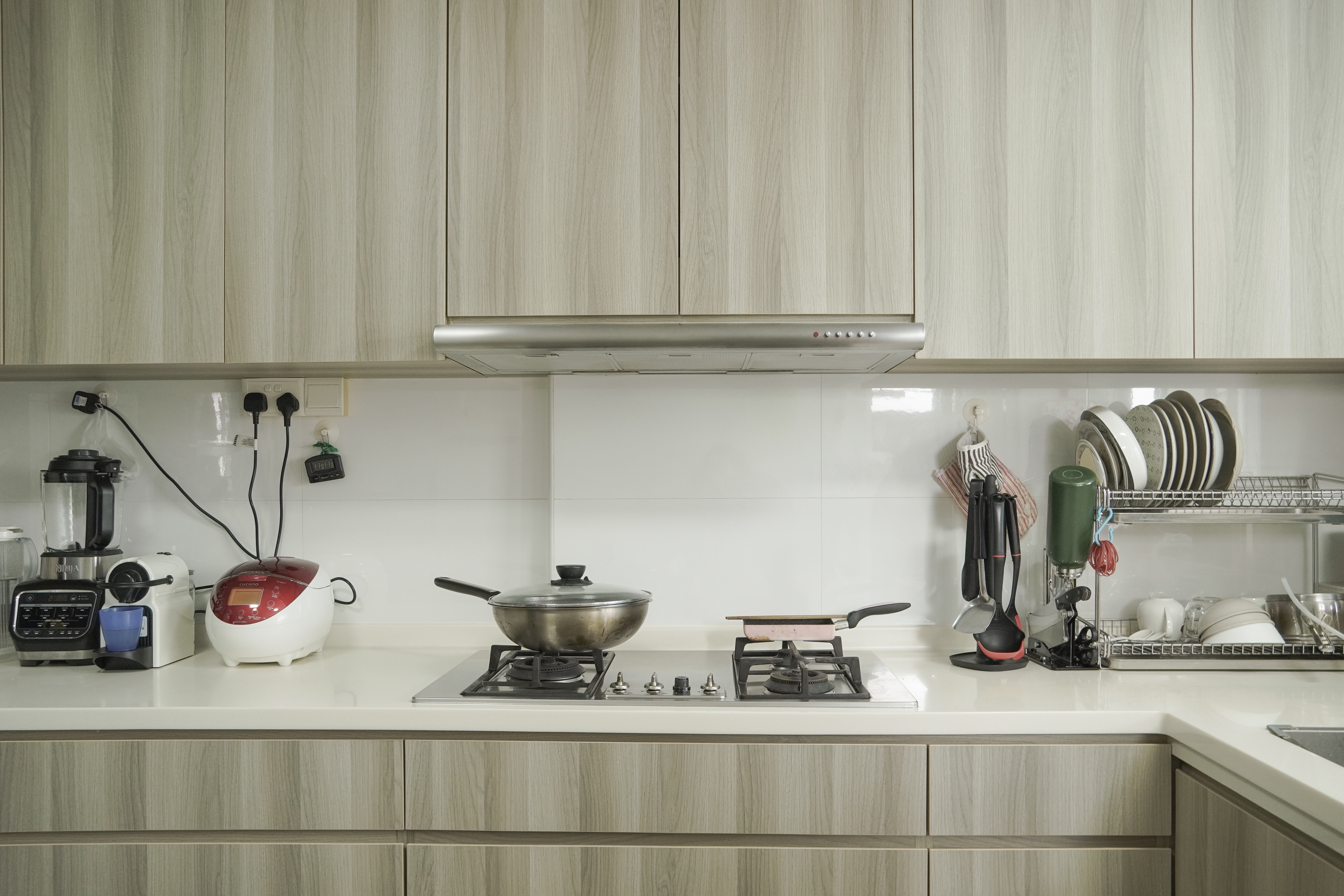 Living in Shared Spaces | Long Kitchen Design of a 5RM Resale - Wooden kitchen cabinets, modern appliances, white tiled