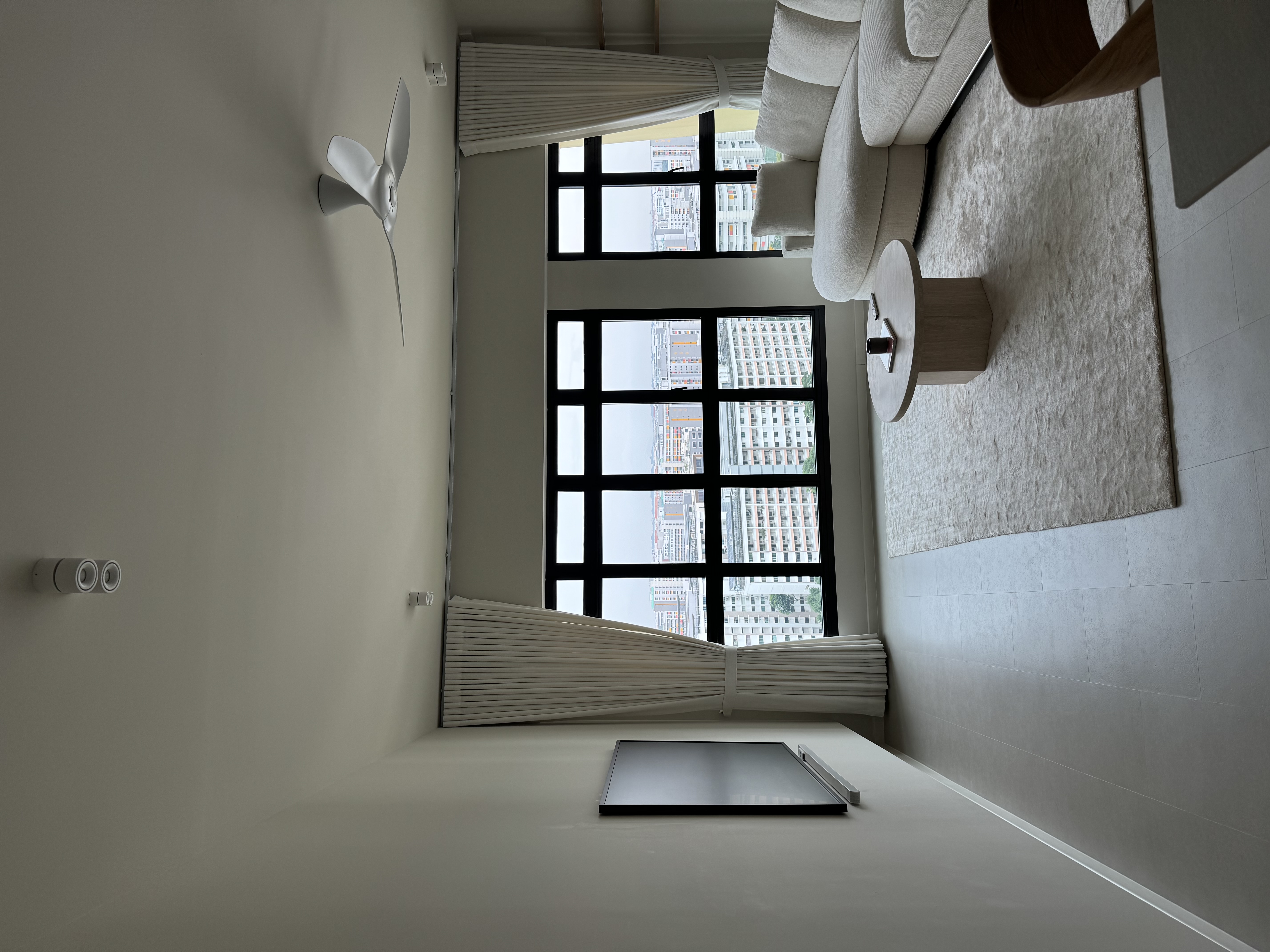 Edition Hotel Inspired House Tour | 5-Room BTO - Modern minimalist living room, large window with cityscape view, white