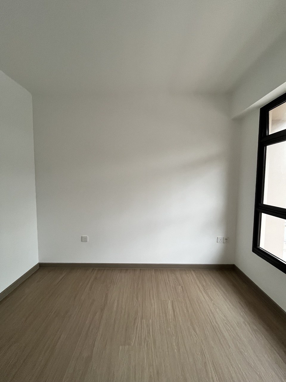 Before & After: Queen-Sized Storage Platform Bed in the Common Room? - Empty room, minimalist design, white walls, wooden