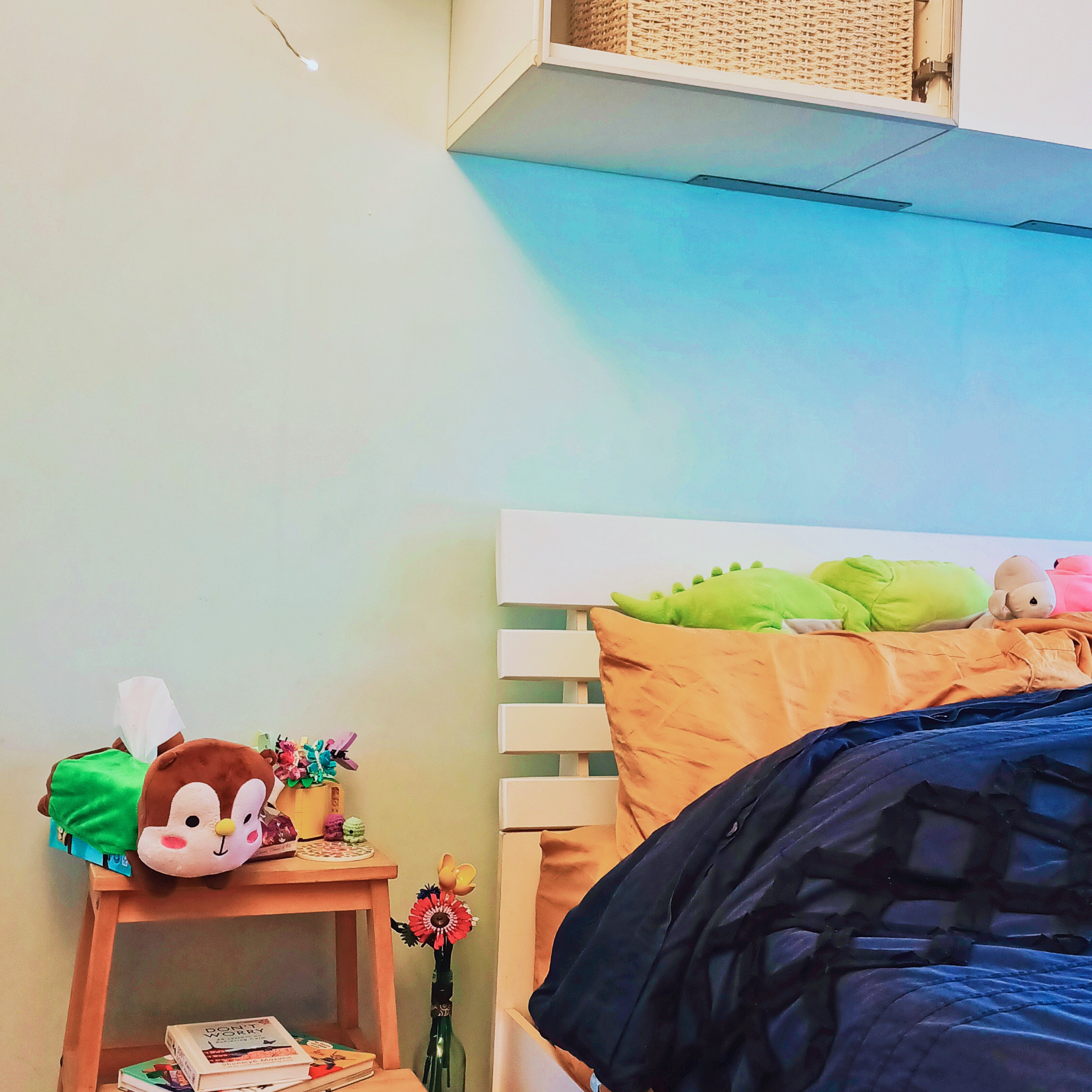 26K Cozy Rustic Home with Swing and Study Corridor - Colorful wall, plush toys, green and pink animals, orange bedspread